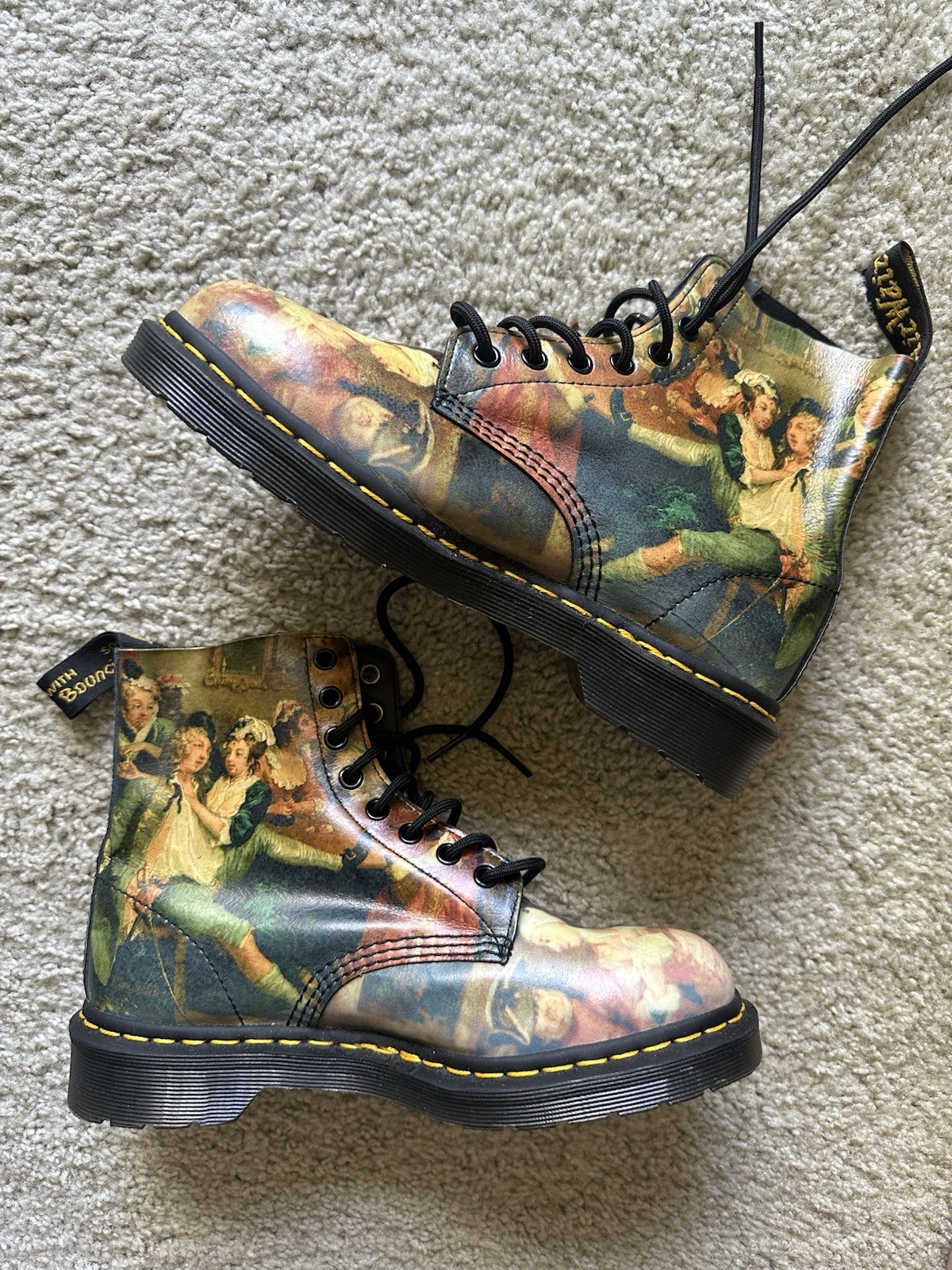 Dr. Martens 1460 Pascal boots with an all-over Renaissance/classical art print.