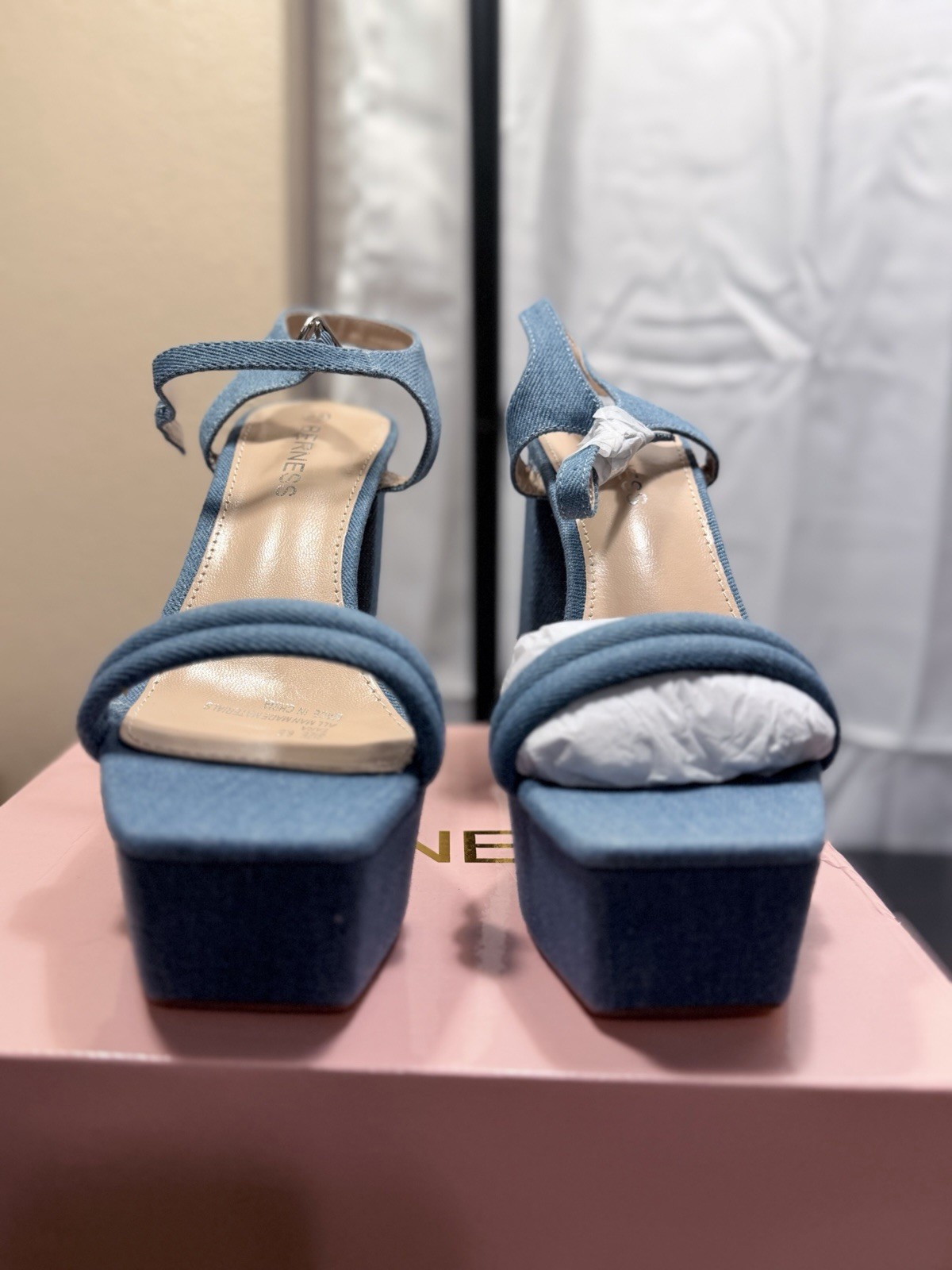 Blue Berness denim platform heels with bow detail