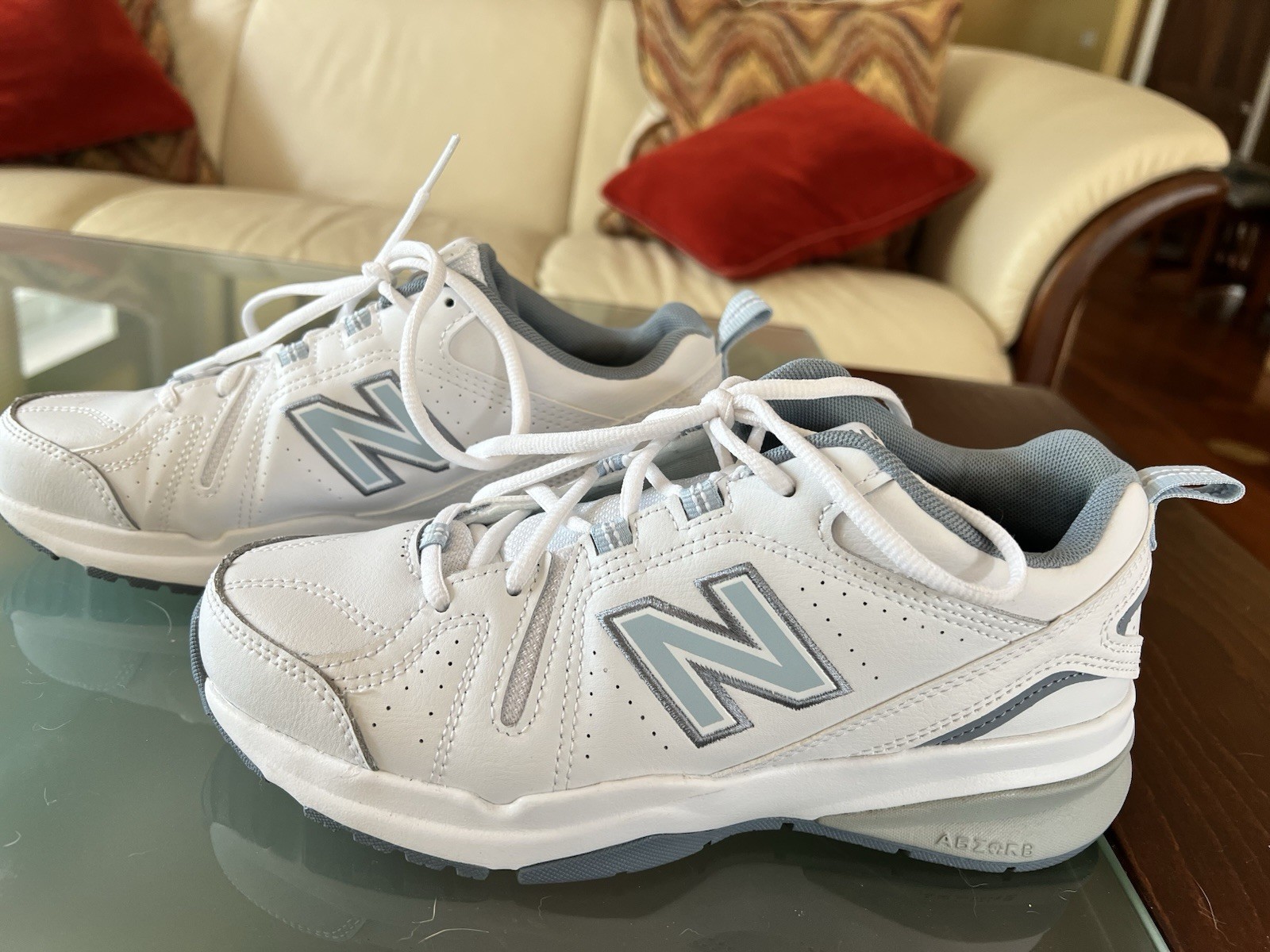 Preowned New Balance 608 size 8M White walking sneakers. Worn 3 times!