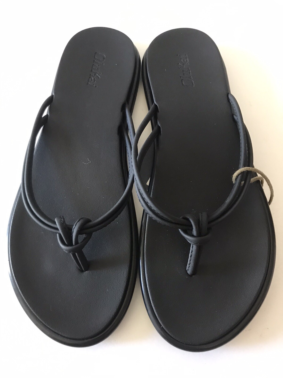 WOMEN’S OLUKAI BLACK ‘AKA KNOTTED STRAPS BEACH/POOL FLIP FLOP SANDALS SIZE 7 NWT
