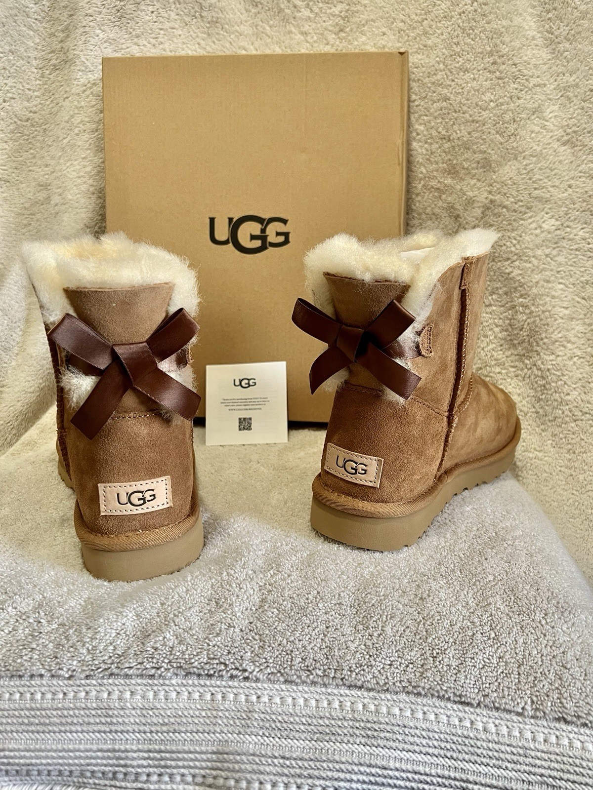 UGG Women’s Mini Bailey Bow II Suede Sheepskin Lined Pull-On Ankle Bootie 7