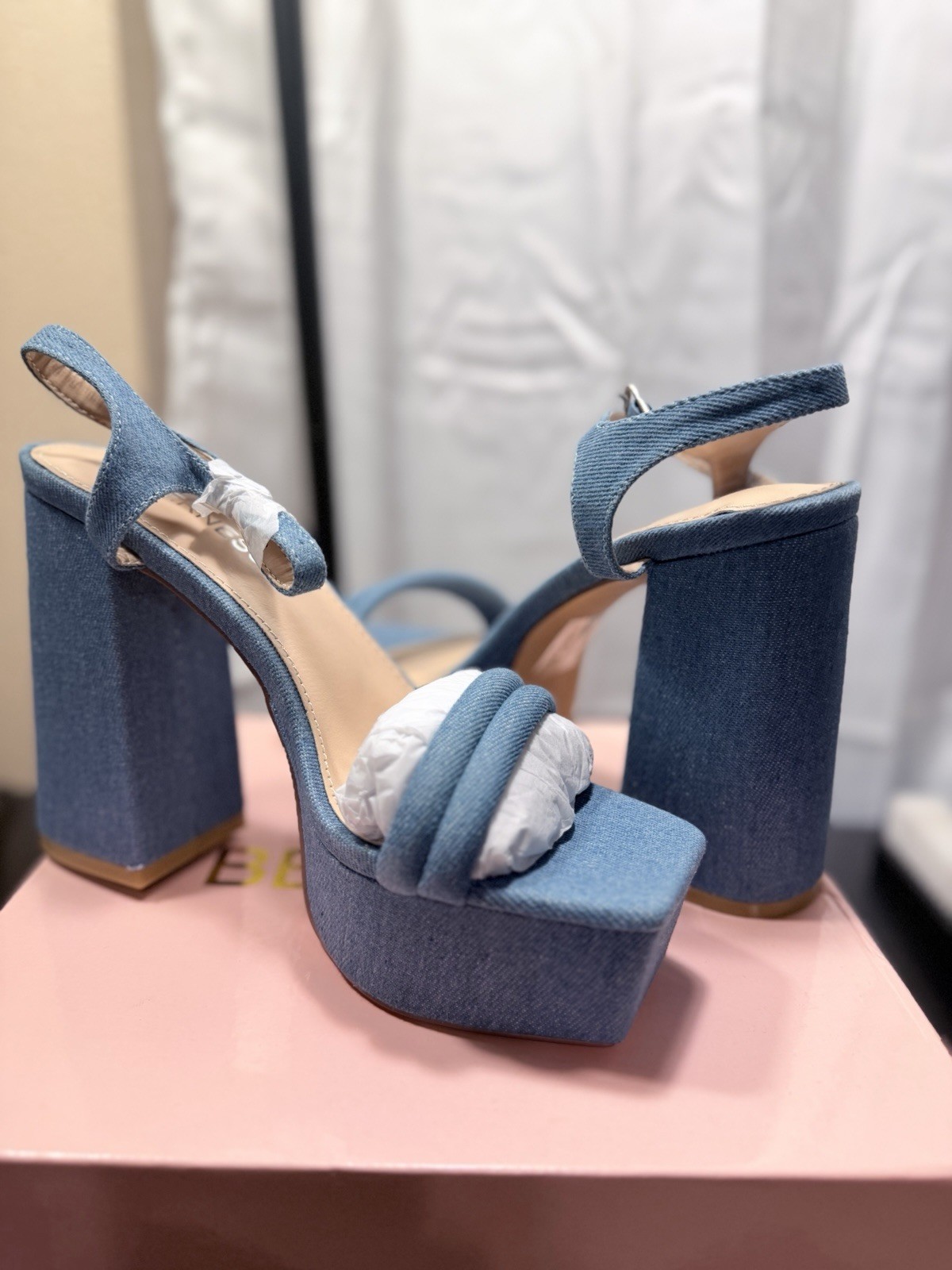 Blue Berness denim platform heels with bow detail