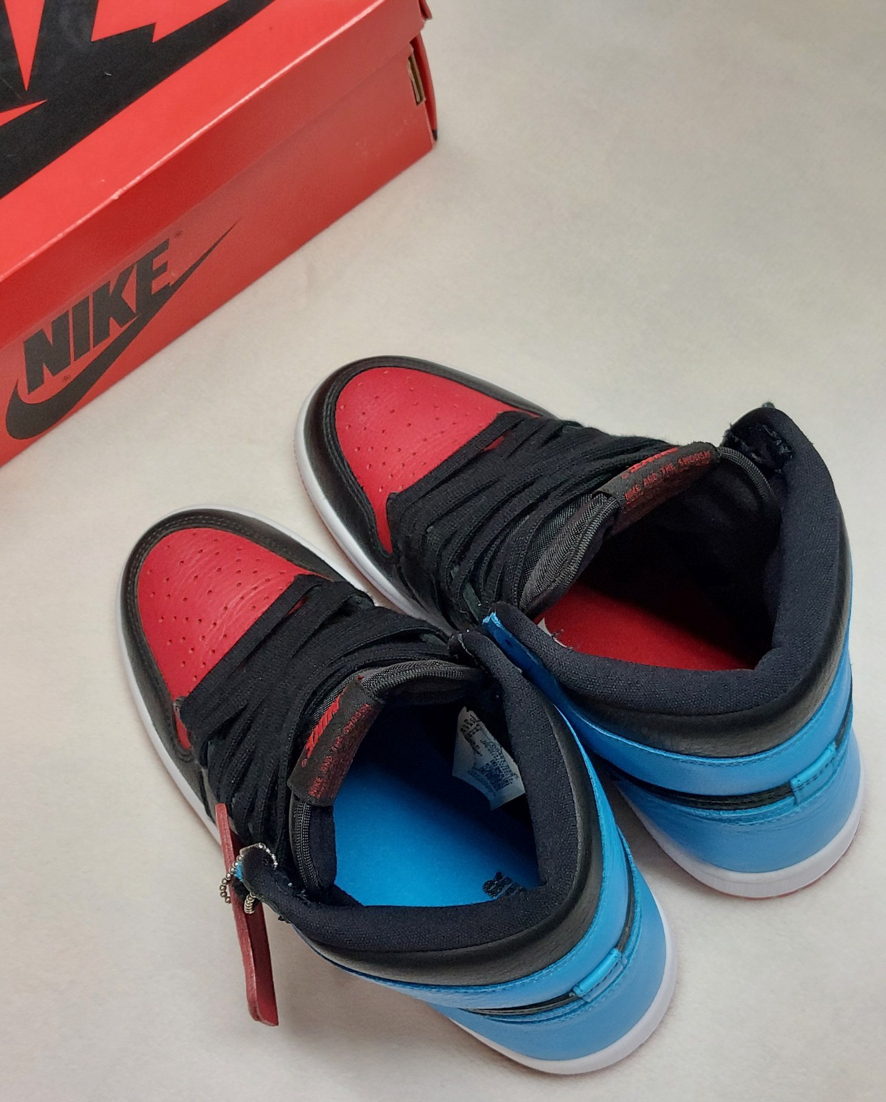 Women’s NIKE Air Jordan 1 High OG Black/Blue/Red Size 7