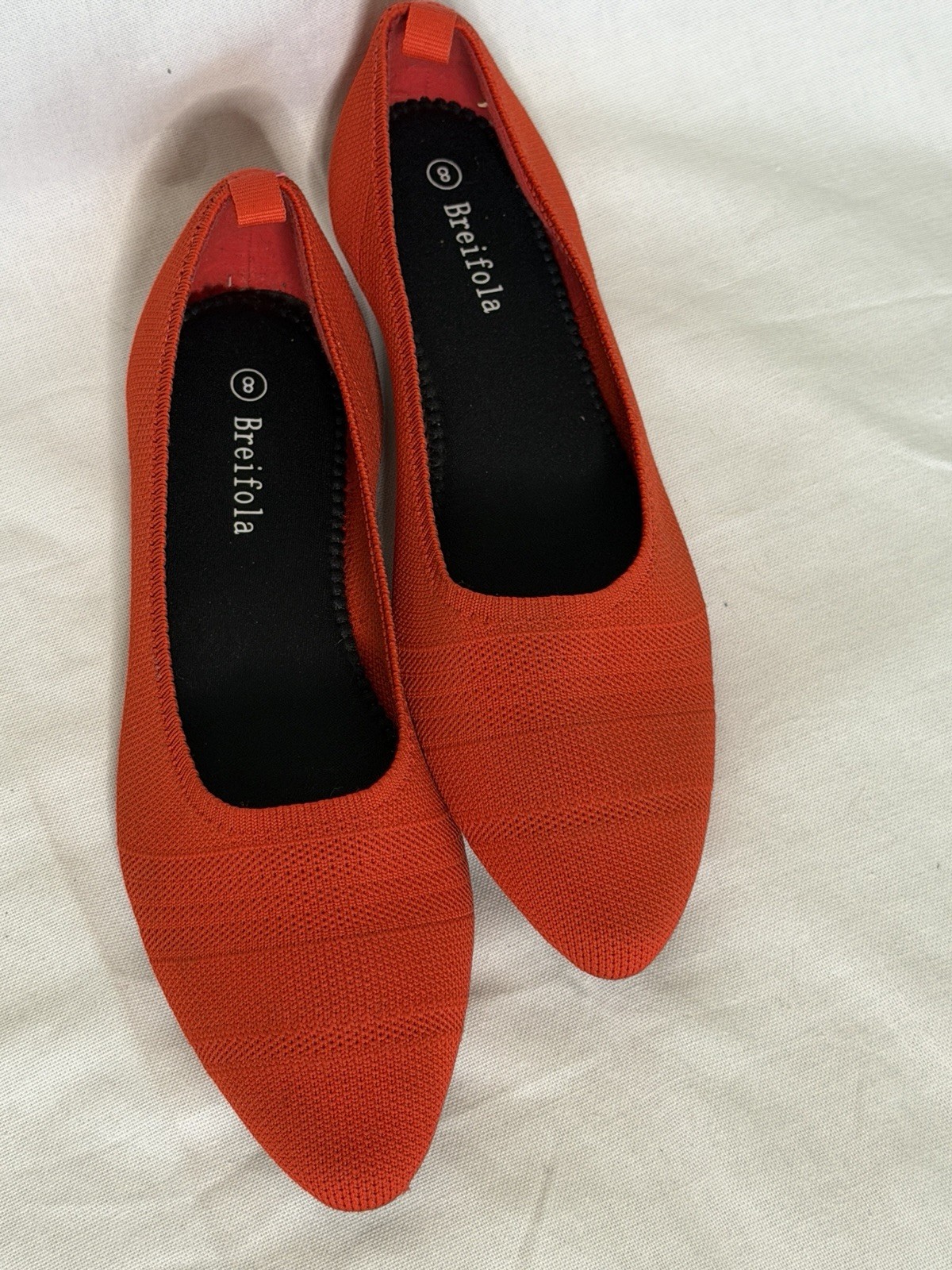 Breifola pointed-toe ballet flats in red with a textile knit upper.