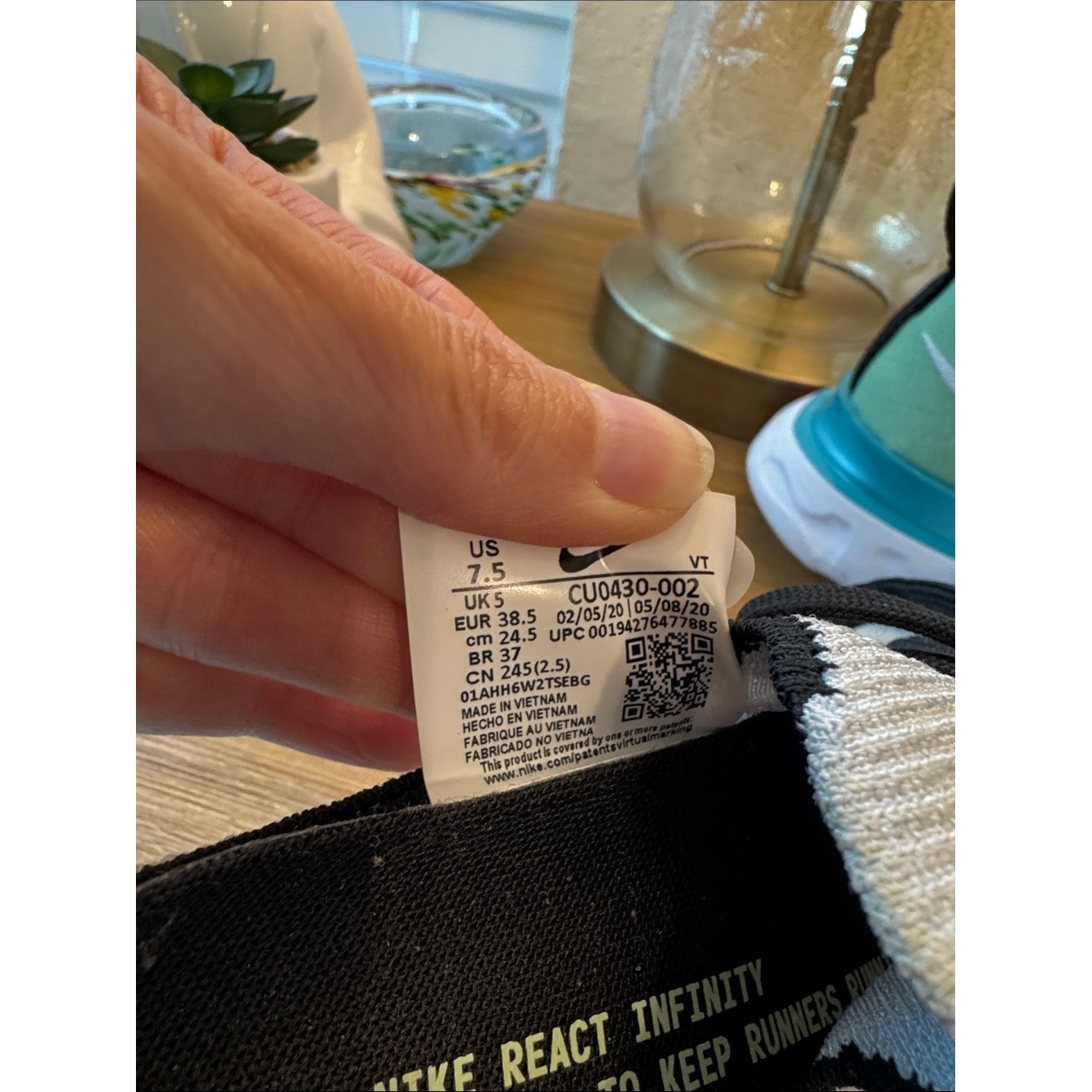 Nike React Infinity White Athletic Sneakers with Teal, Yellow & Red Accents