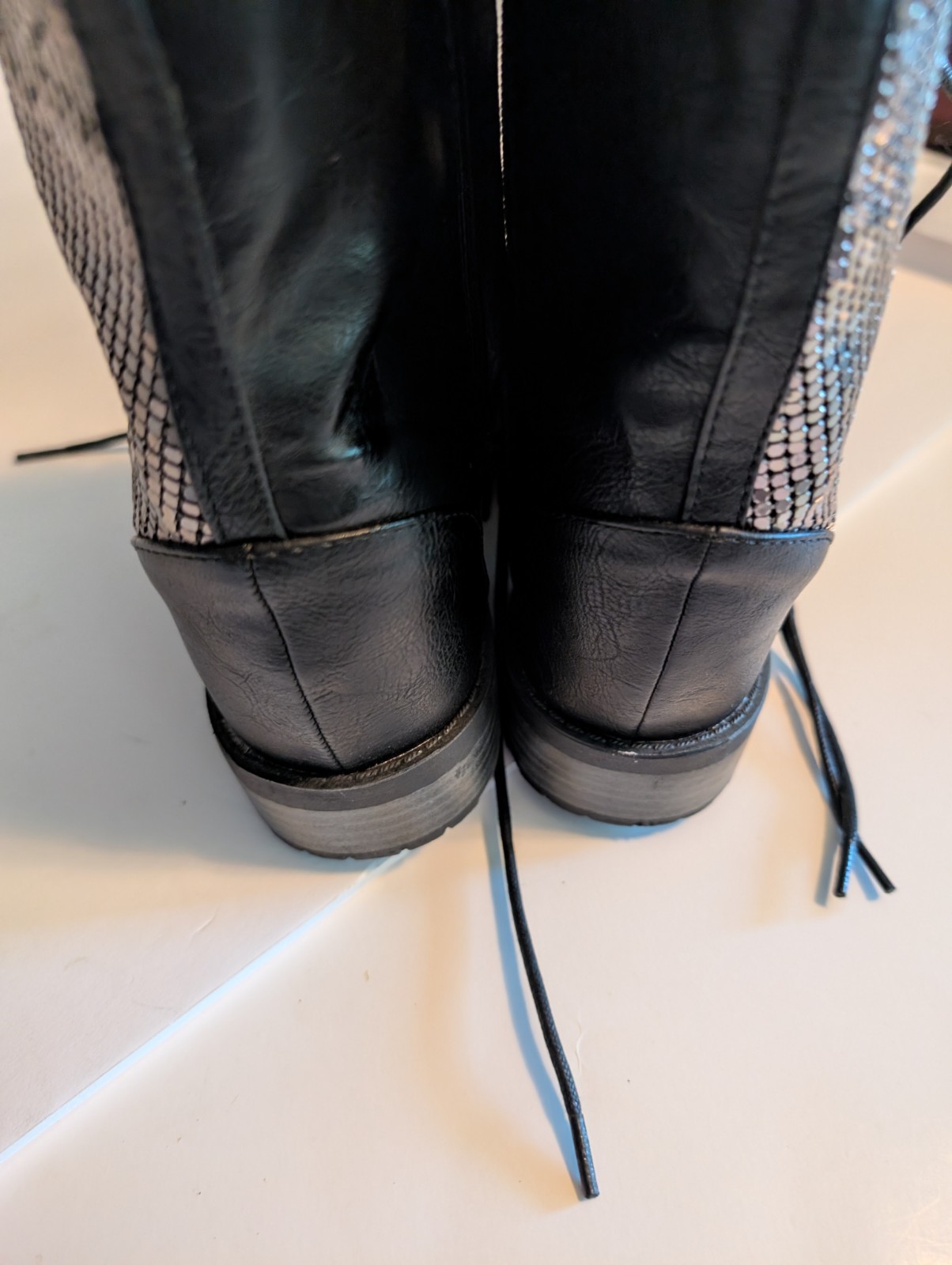 Black faux leather women’s lace up with silver accents boots size 6.5