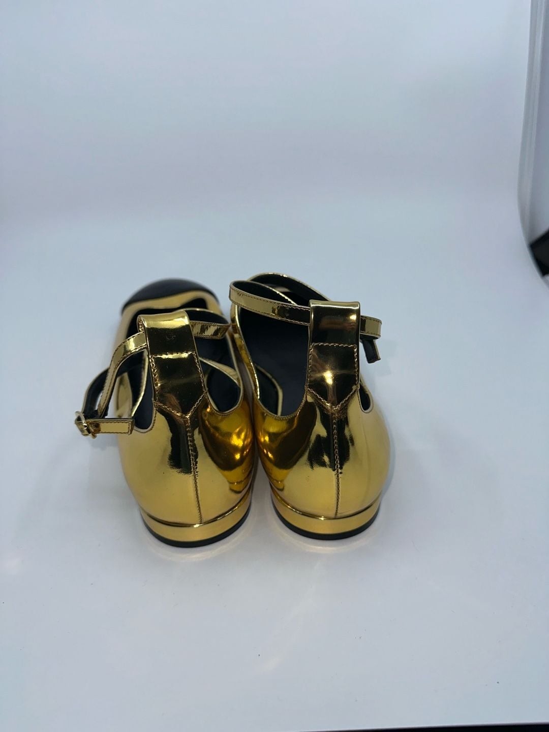 Stuart Weitzman Gold Metallic Mary Jane Flats with Black Cap Toe