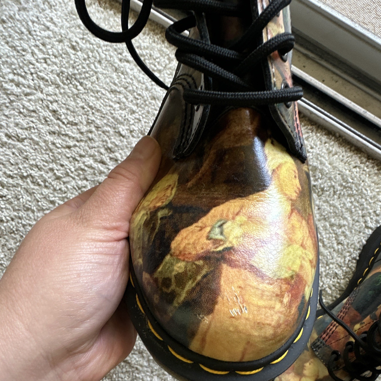 Dr. Martens 1460 Pascal boots with an all-over Renaissance/classical art print.