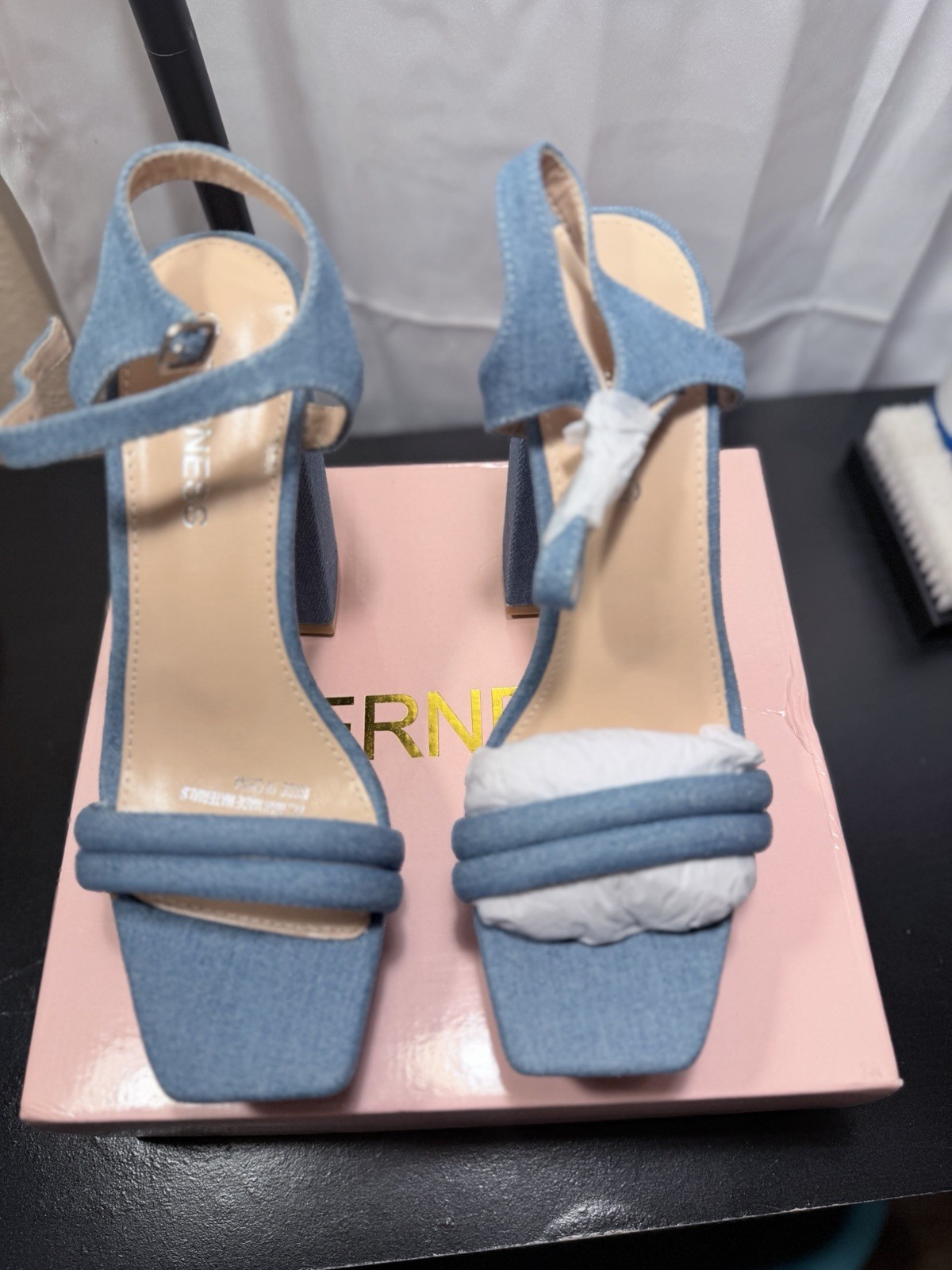 Blue Berness denim platform heels with bow detail