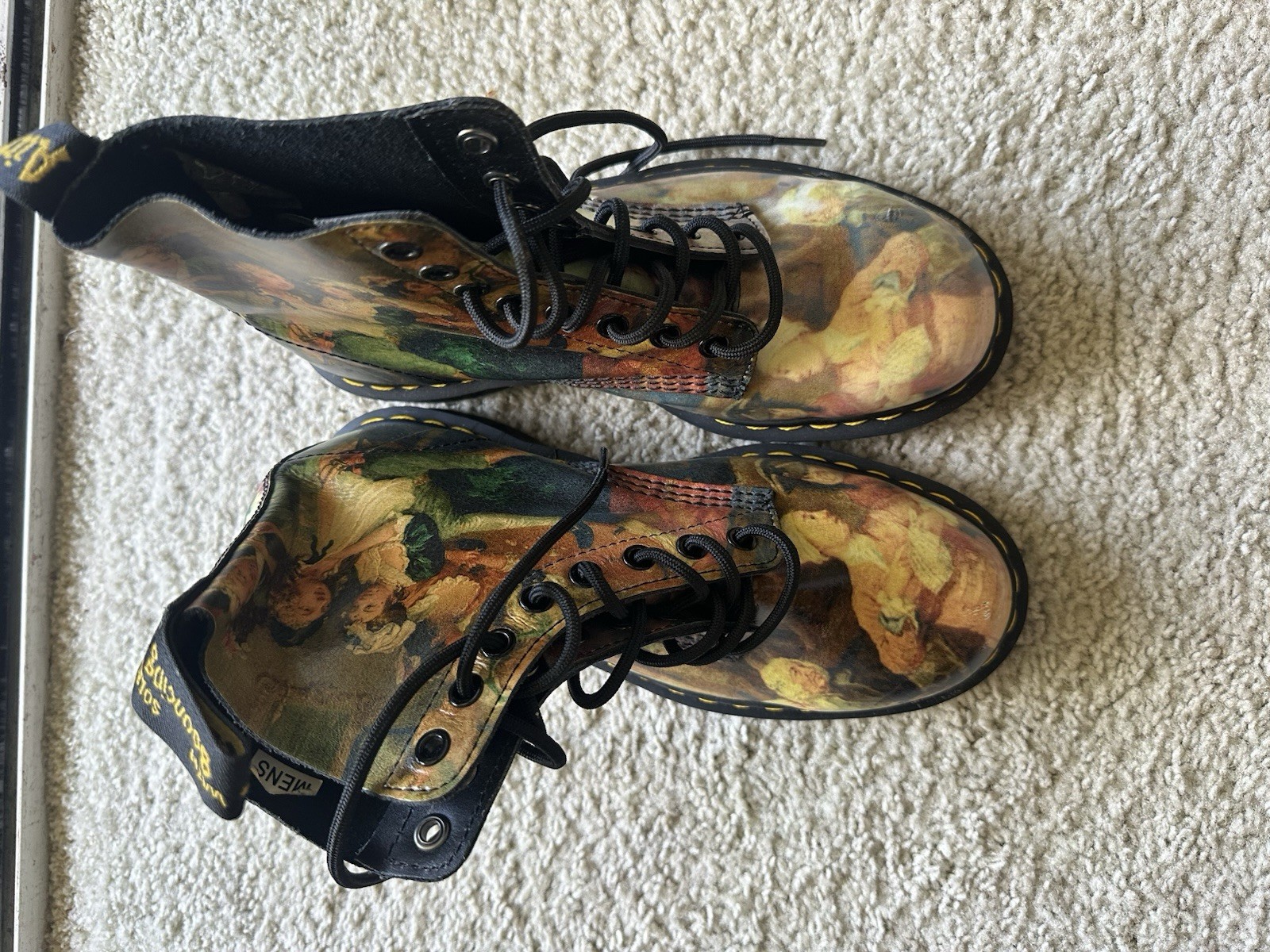 Dr. Martens 1460 Pascal boots with an all-over Renaissance/classical art print.