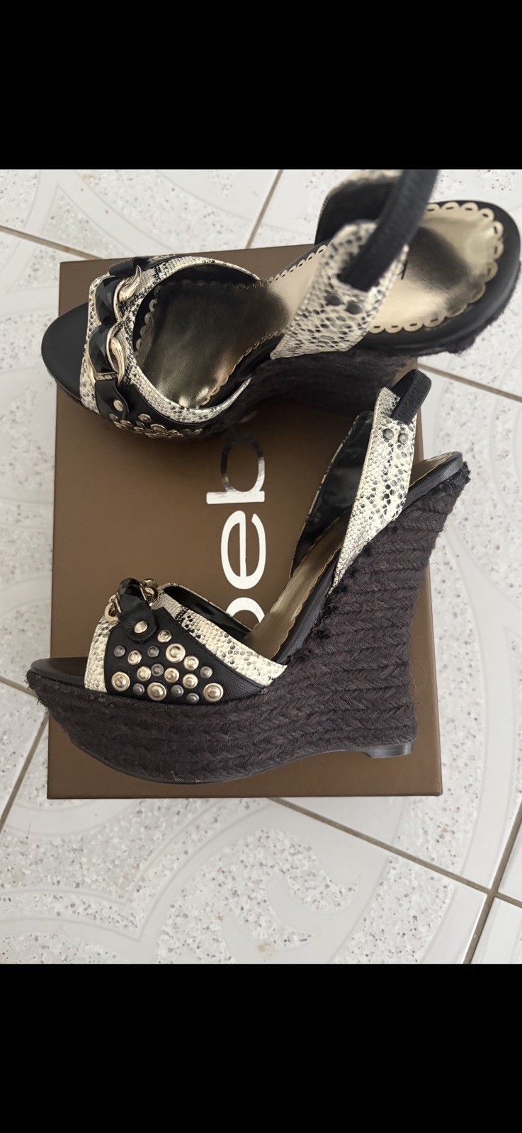 Bebe “Sterling Update” Black/White wedge sandal. Size 8. Brand new. Beautiful!!