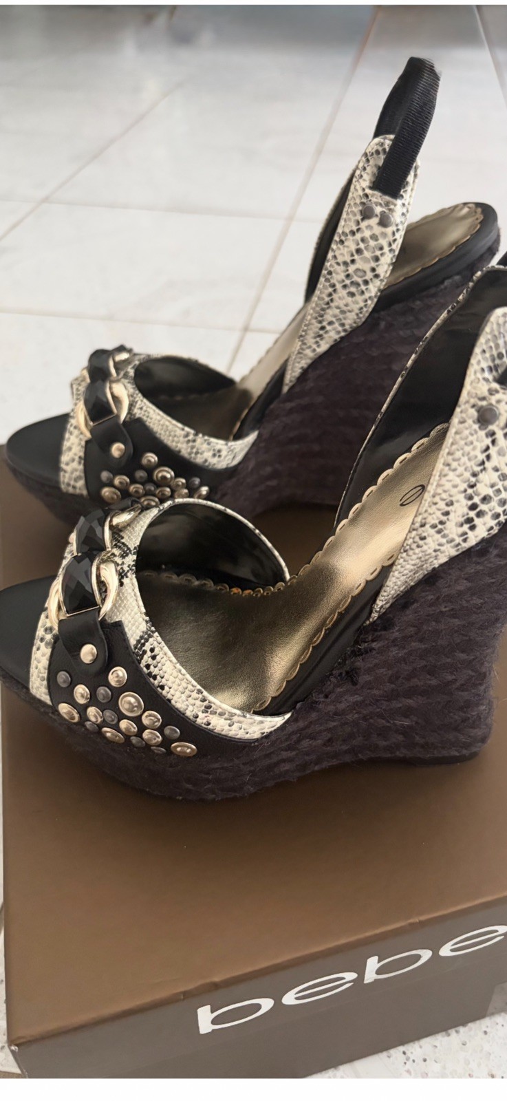 Bebe “Sterling Update” Black/White wedge sandal. Size 8. Brand new. Beautiful!!