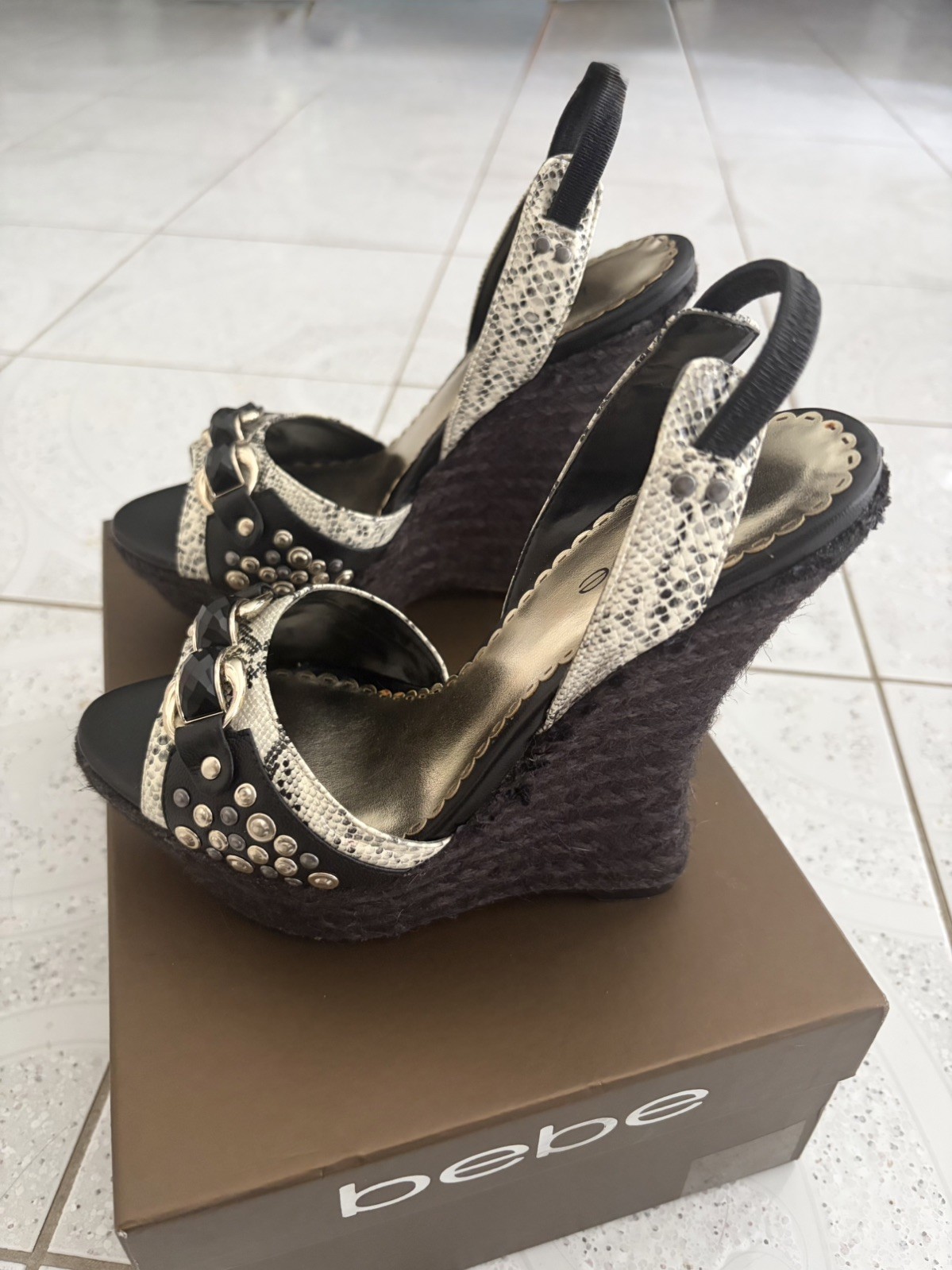 Bebe “Sterling Update” Black/White wedge sandal. Size 8. Brand new. Beautiful!!