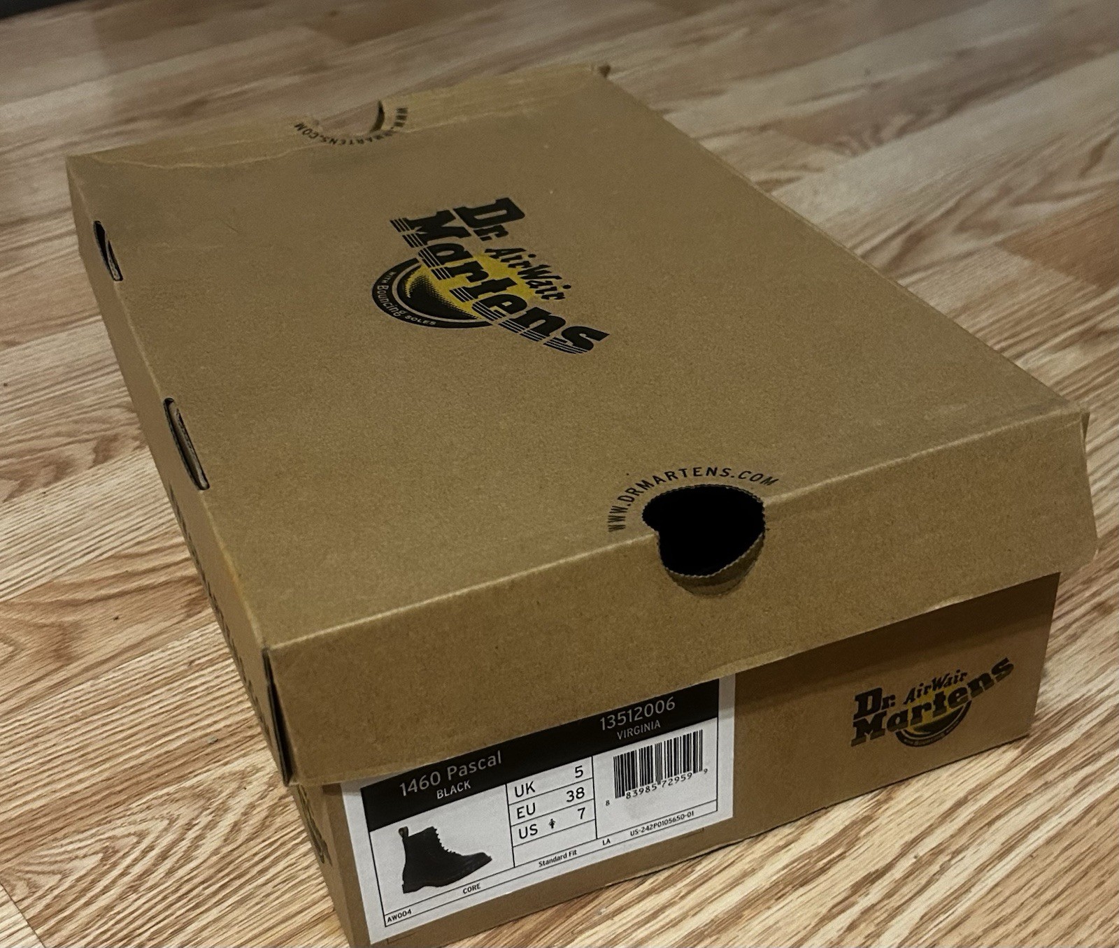 Brand new, never worn Dr. Martens 1460 Pascal boots in black pebbled leather.