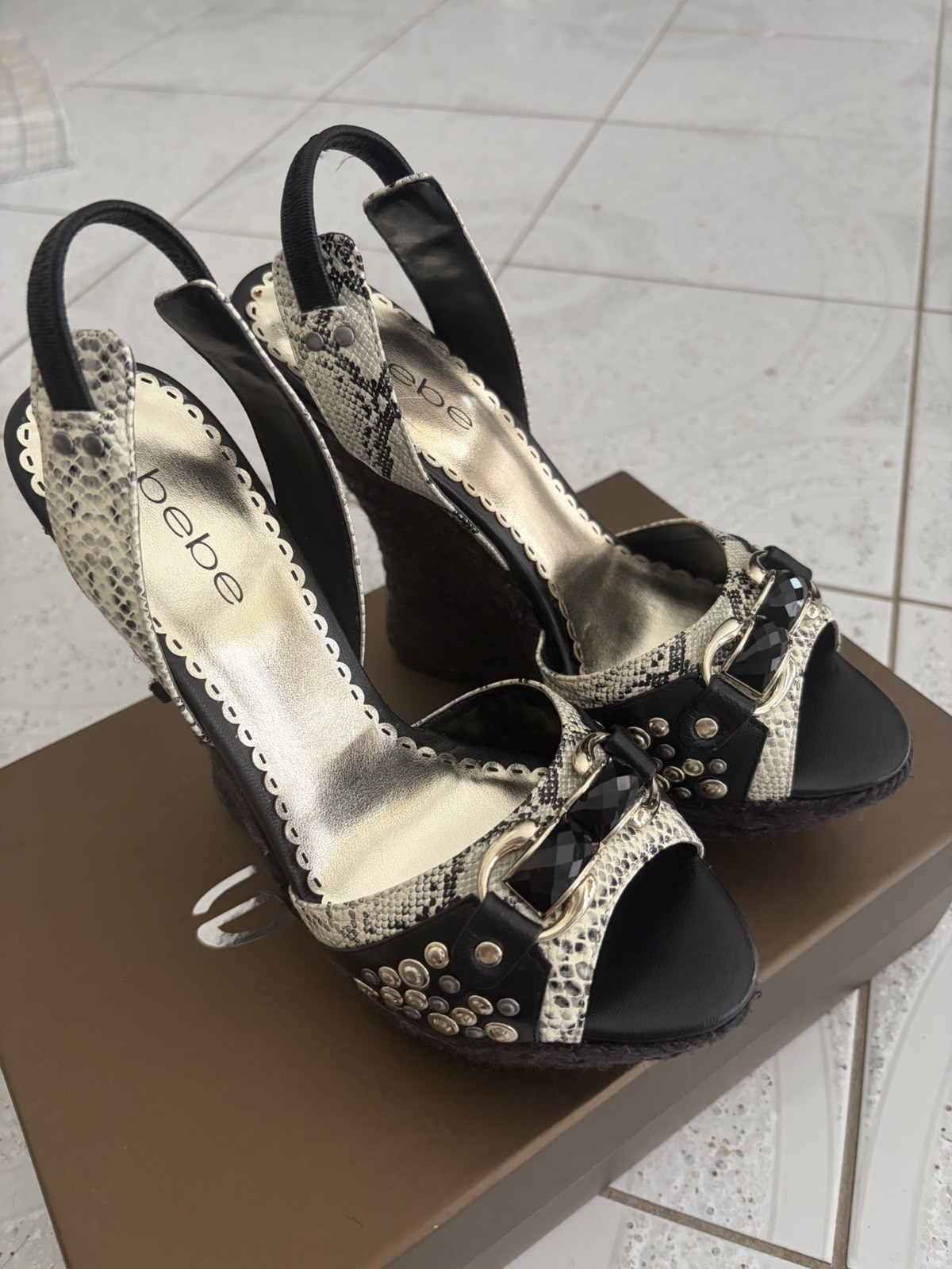 Bebe “Sterling Update” Black/White wedge sandal. Size 8. Brand new. Beautiful!!