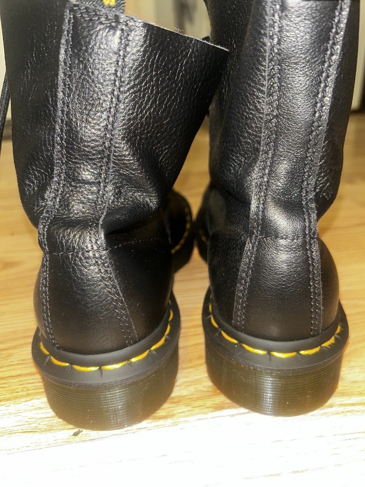 Brand new, never worn Dr. Martens 1460 Pascal boots in black pebbled leather.