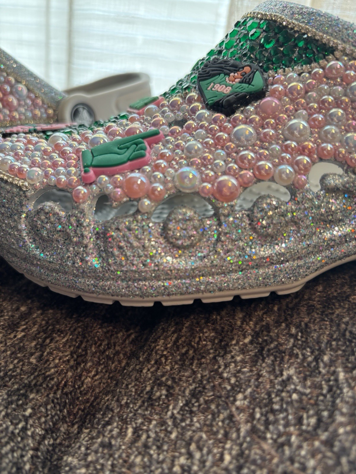 Custom bedazzled ‘AKA’ Silver Glitter Crocs (Pink N Green)