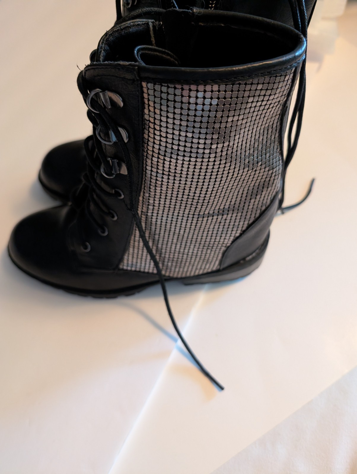 Black faux leather women’s lace up with silver accents boots size 6.5