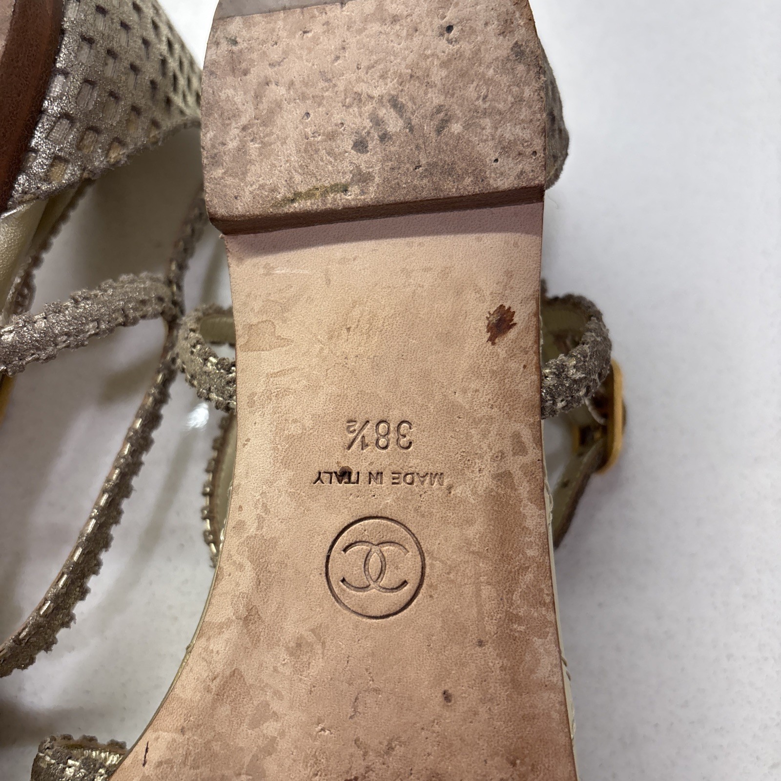 Chanel Gold Quilted CC Camellia Sandals, featuring a metallic bronze flower—EUC