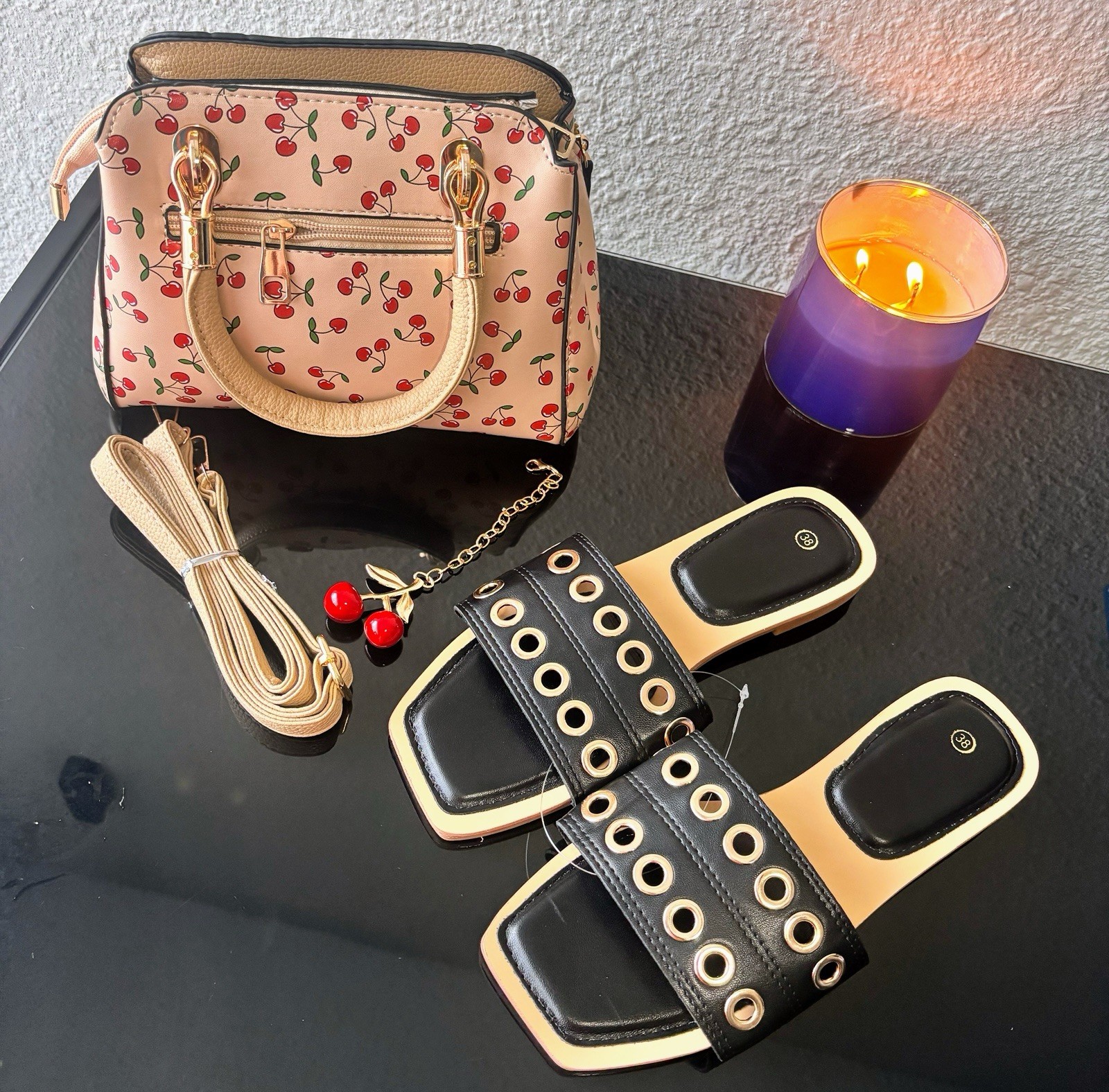 New women’s handbags and flat sandals. Available separately or as a set.