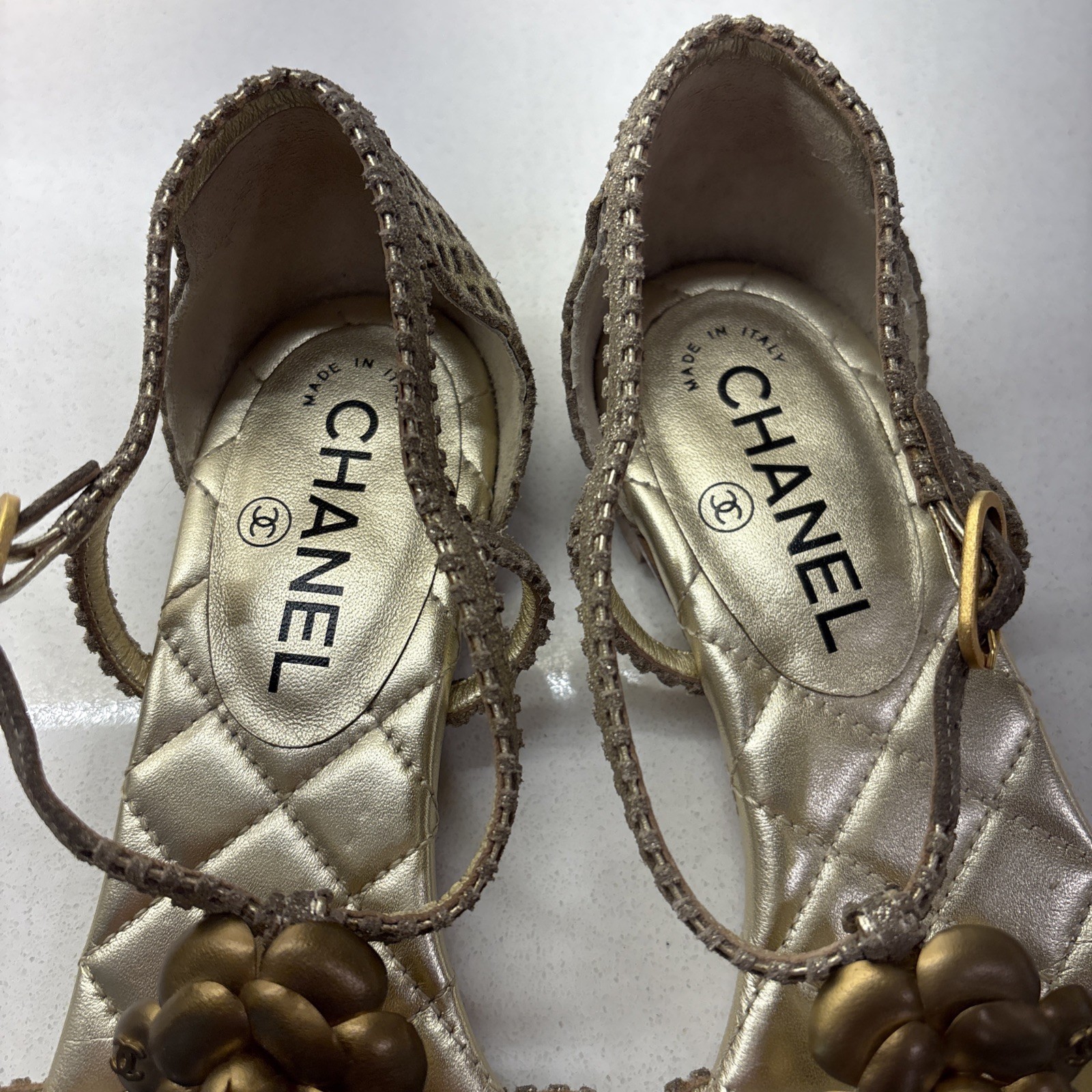 Chanel Gold Quilted CC Camellia Sandals, featuring a metallic bronze flower—EUC