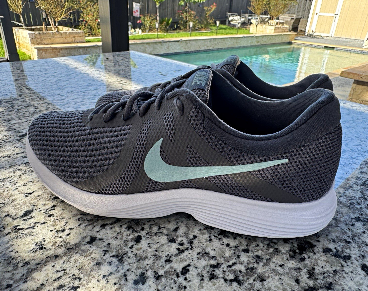 Nike Wmns Revolution 4 «Gunsmoke / Ocean Bliss / Dark Grey» women’s size 10