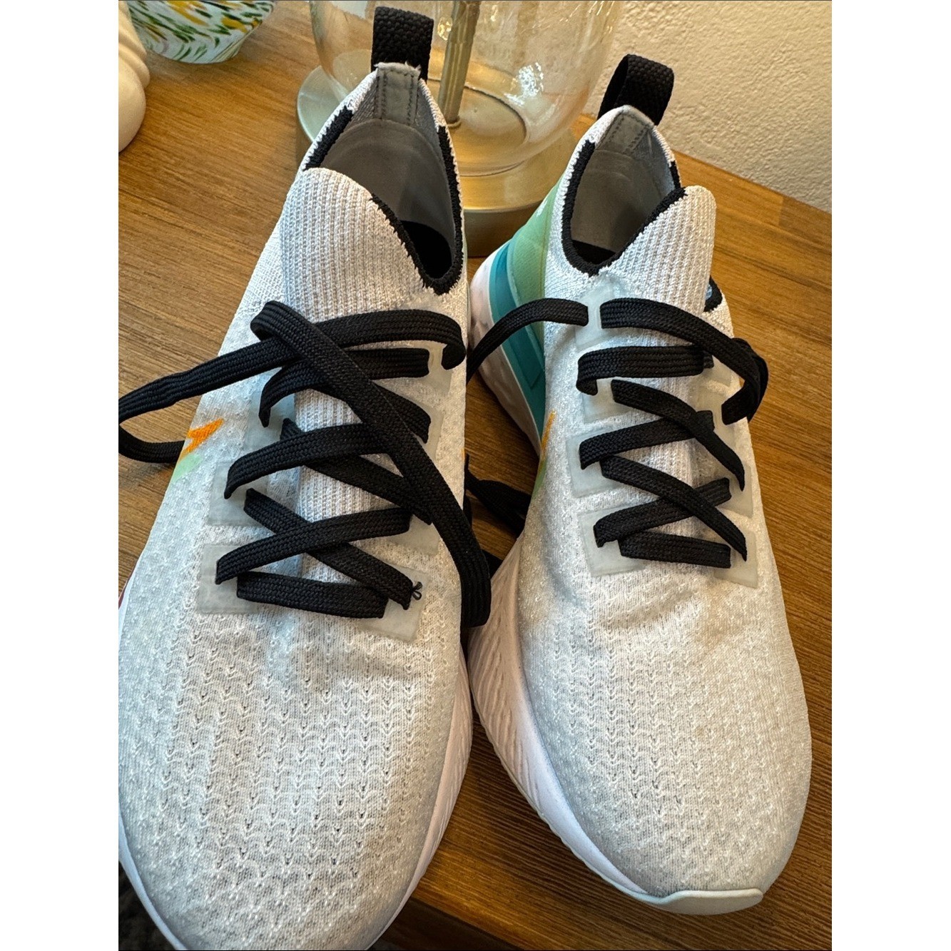 Nike React Infinity White Athletic Sneakers with Teal, Yellow & Red Accents