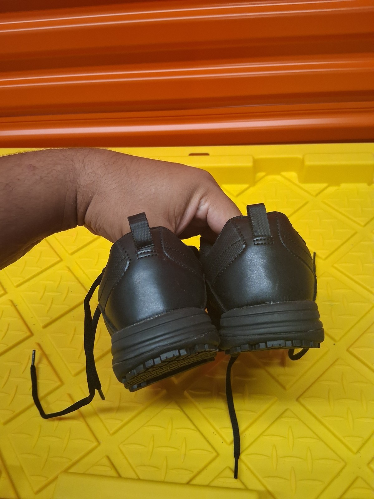 SafeTstep brand, durable faux leather upper and a classic lace-up design