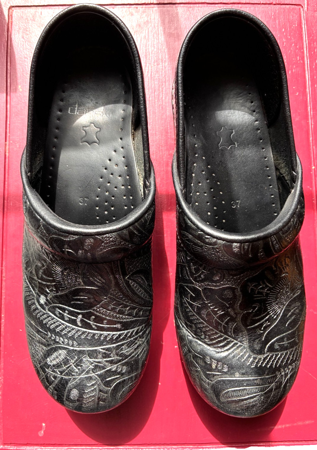 Dansko Black Embossed Leather Clogs