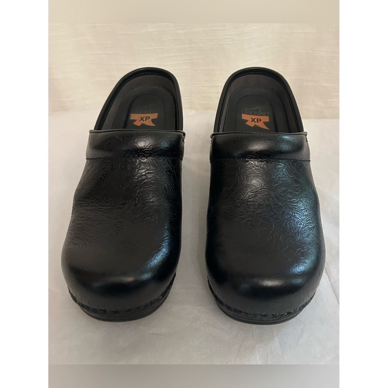 Dansko Black Leather Slip-On Clogs