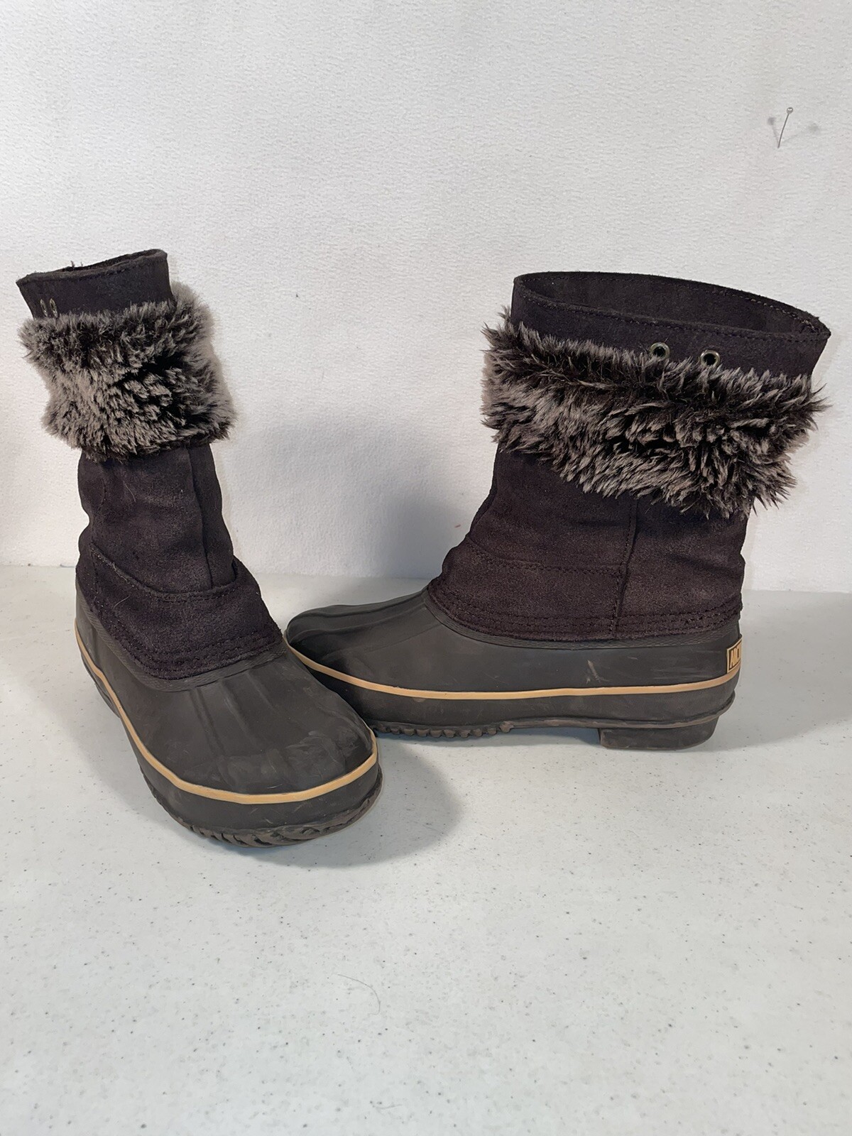 Artic Plunge Oesola, Fuax Fur. Women’s 6.5 steel Shank Snow Boots.