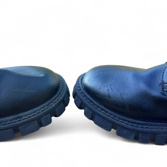 Woman’s black punk boots