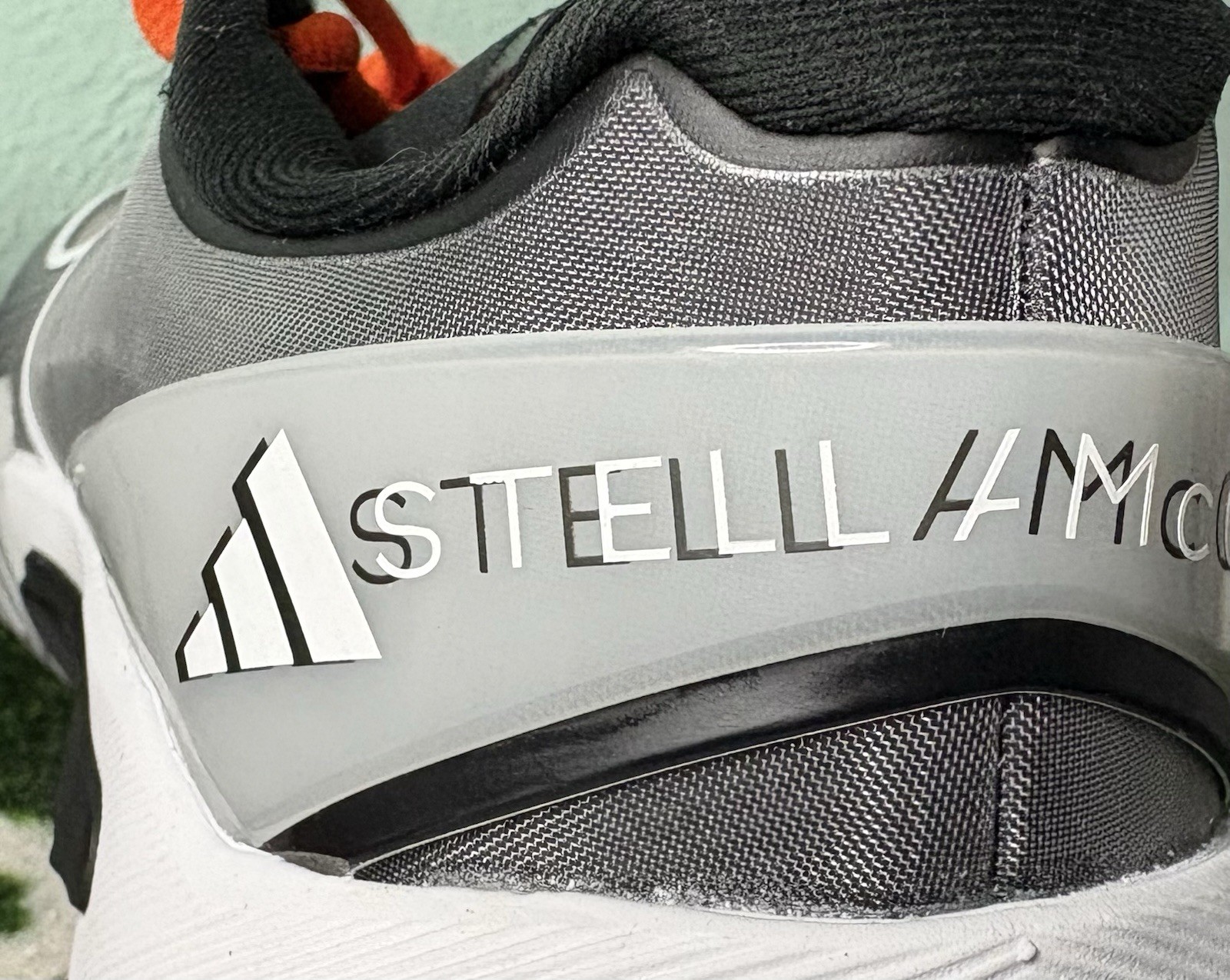 US W 8/M 7 – Stella McCartney x Adidas Barricade “Charcoal Orange” JR3285