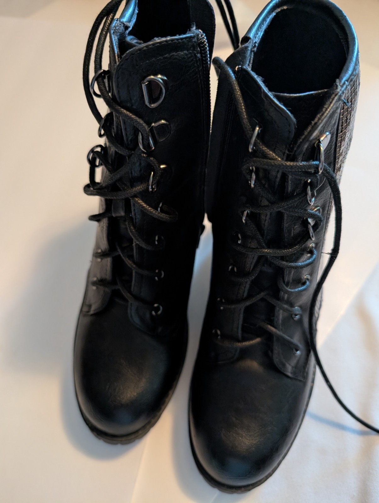 Black faux leather women’s lace up with silver accents boots size 6.5