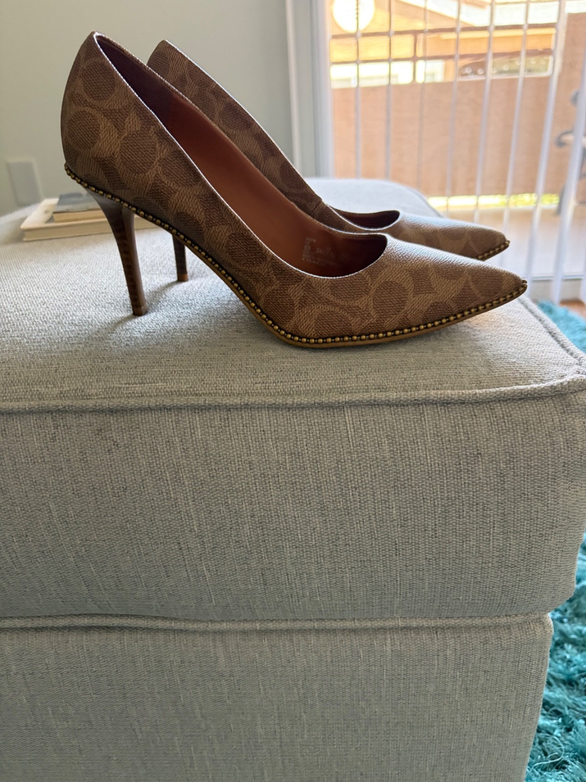 coach heels 8 good condition very classy and elegant color brown