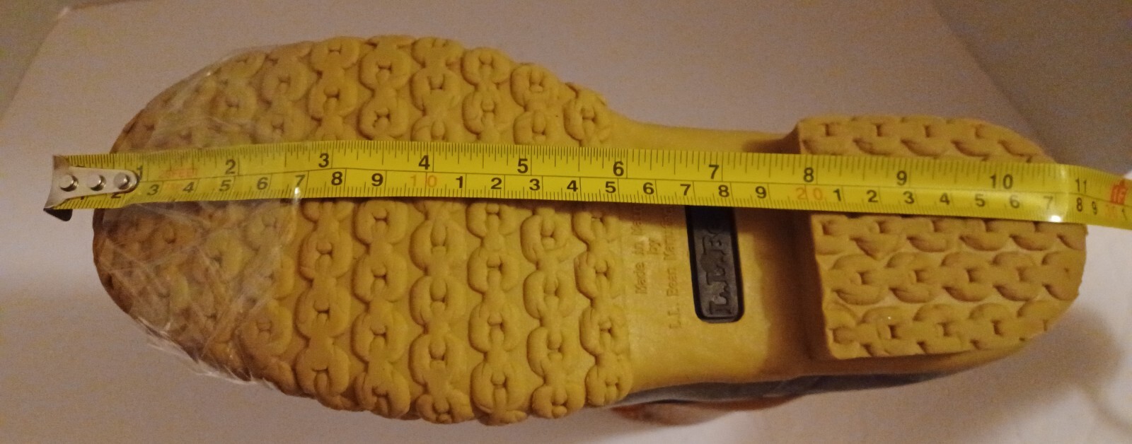 L.L. Bean Boots Duck Boots Feature A Lace Up Closure With Pull Tab On Back.