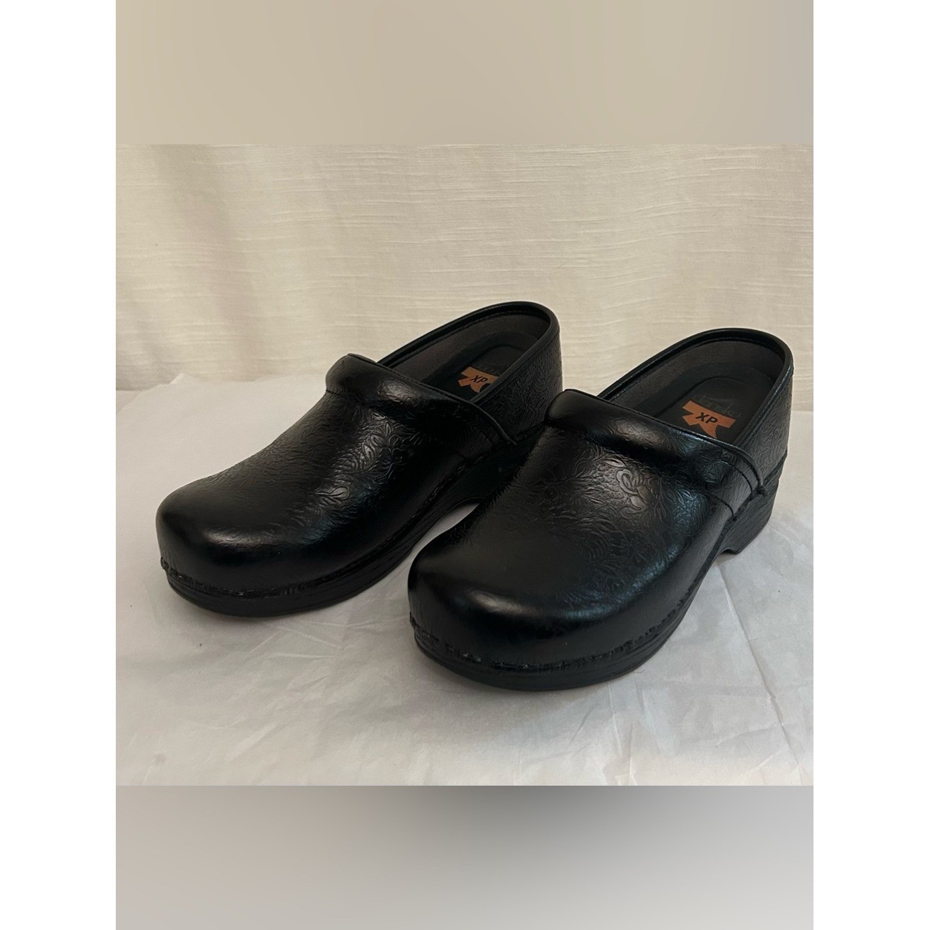 Dansko Black Leather Slip-On Clogs