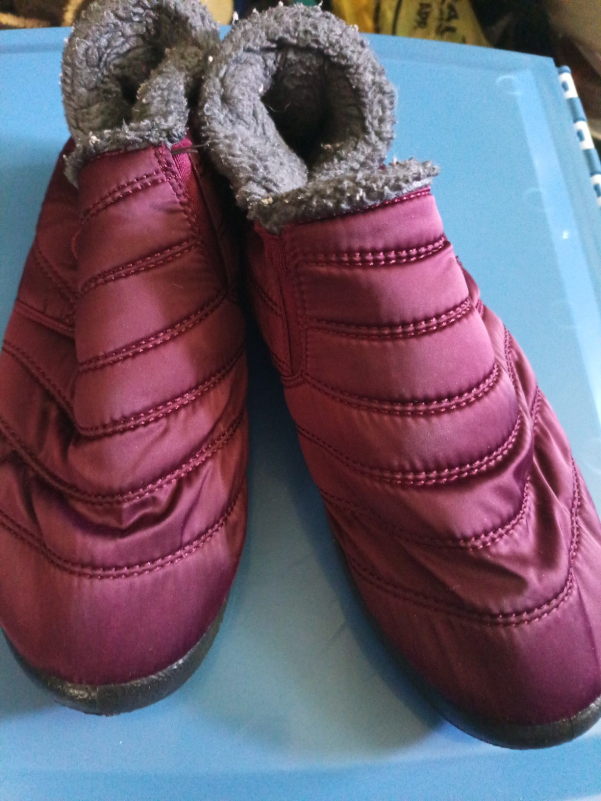 Go brand quilted maroon snow boots feature a plush faux fur lining and a slip-on