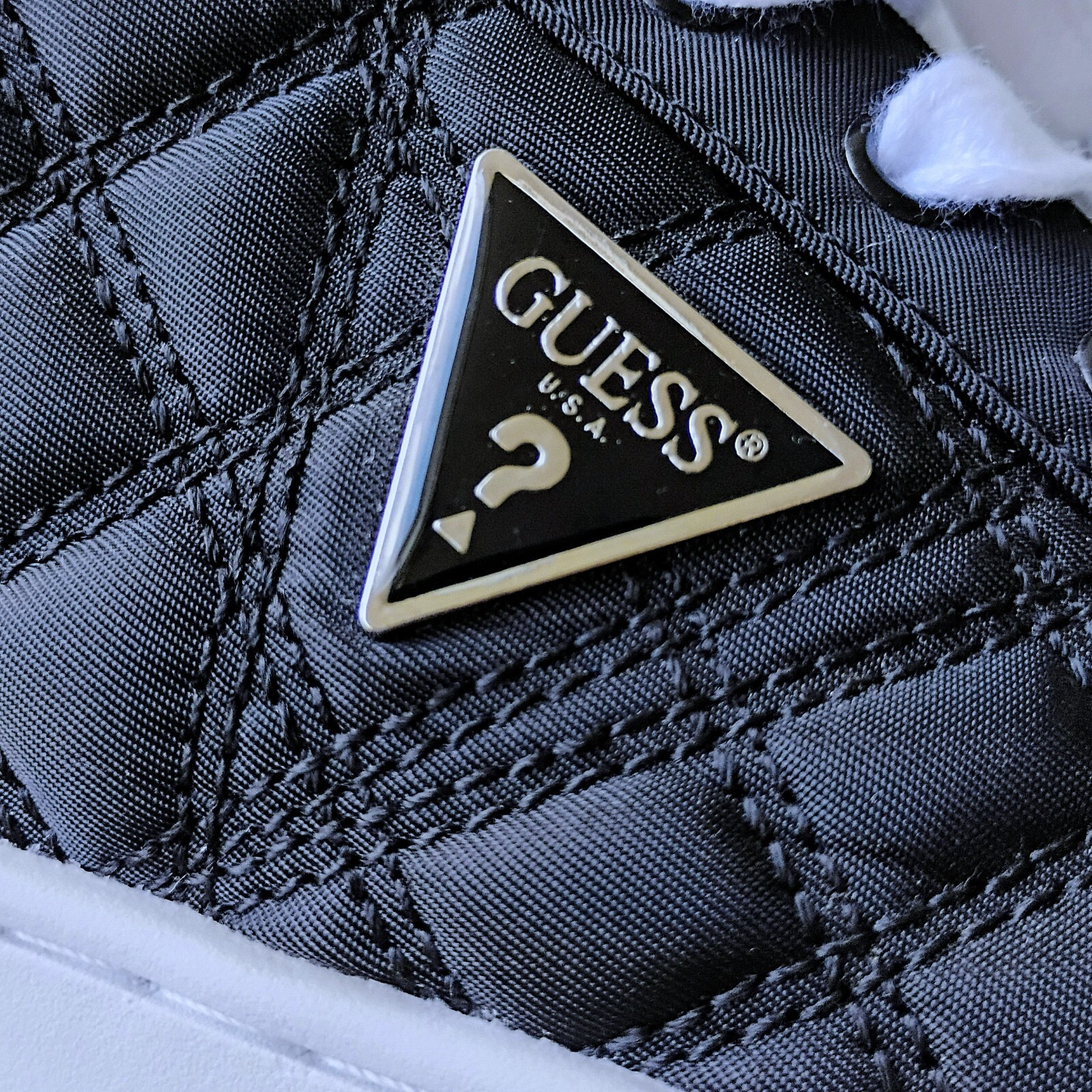 Guess Women’s Tesie Quilted Platform Sneaker in Sophisticated Black Beauty Color