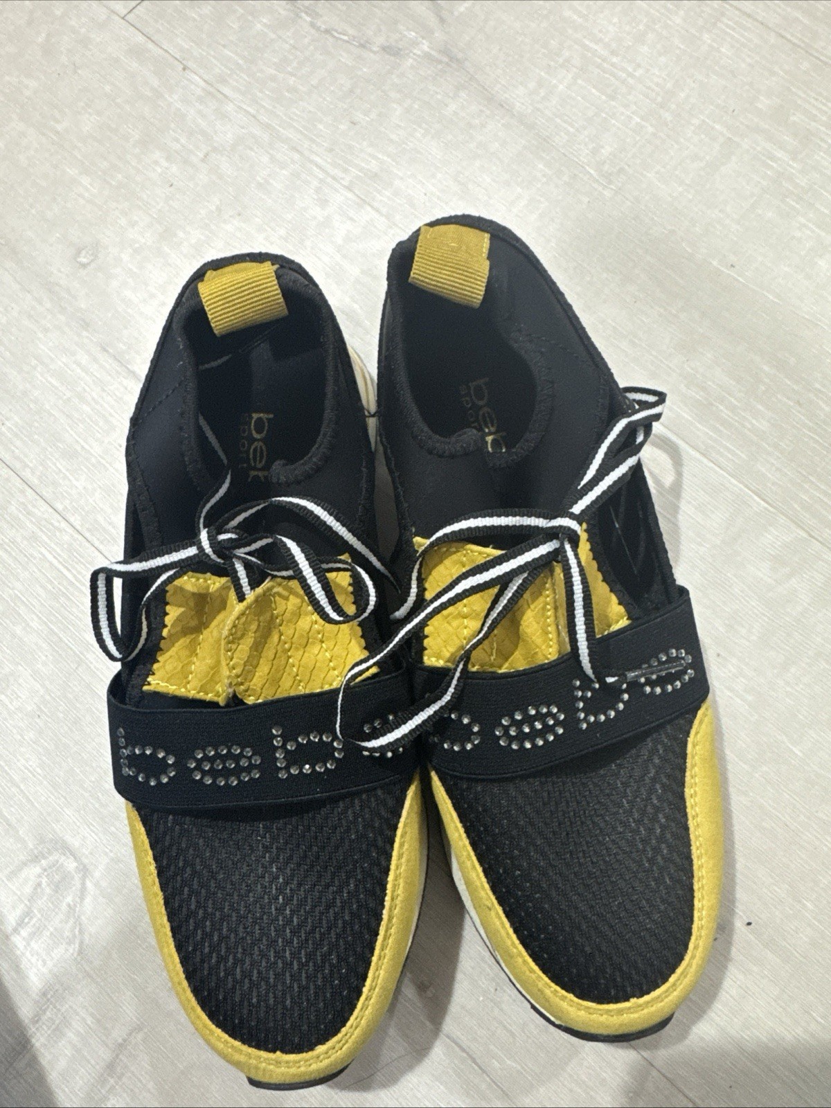bebe Black/Yellow Low Top Lace-Up Athletic Sneakers with Animal Print