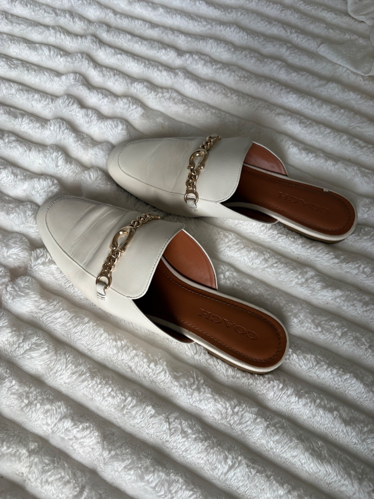Unisex Coach white leather mules with gold chain women’s size 8