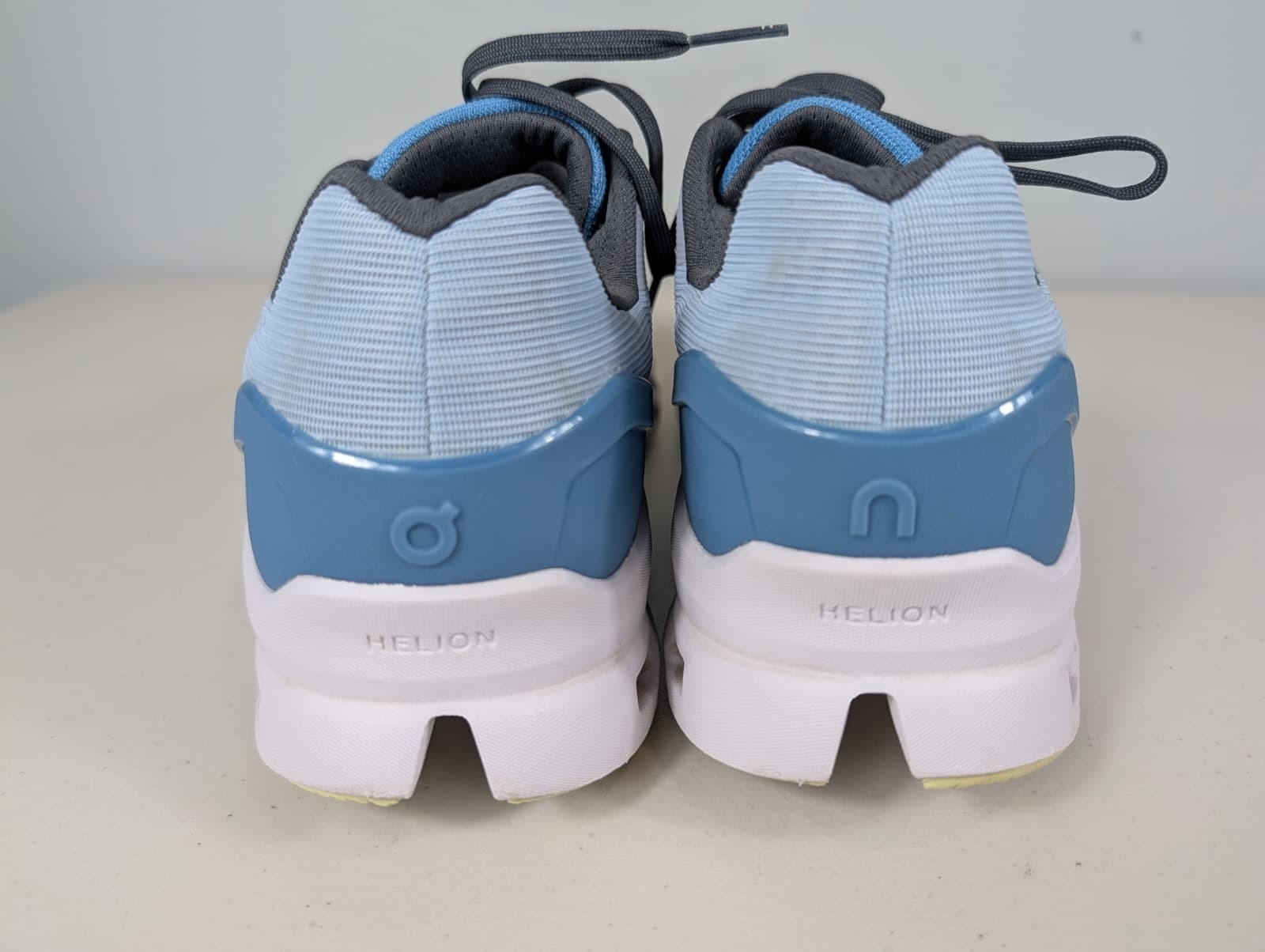 On cloud stratus sneakers in a chambray/lavender blue color women’s size 10W