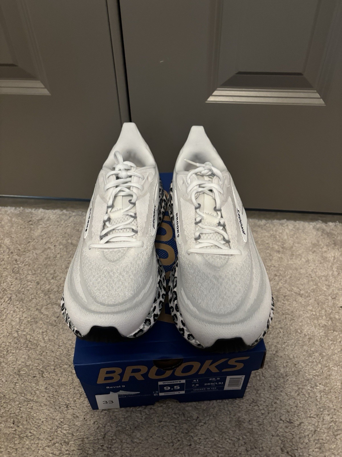 Brooks Revel 9 Low Top Lace Up Athletic Sneaker White/Black Rubber Outsole