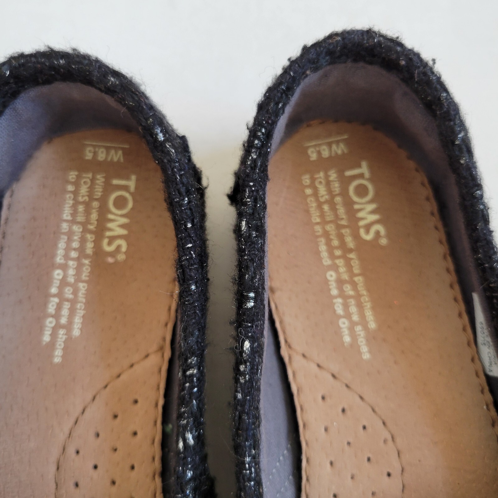 Tom’s Slip Ons Black and Silver Glitter flats Ladies Size 6.5