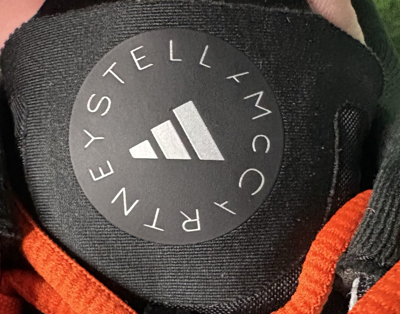 US W 8/M 7 – Stella McCartney x Adidas Barricade “Charcoal Orange” JR3285