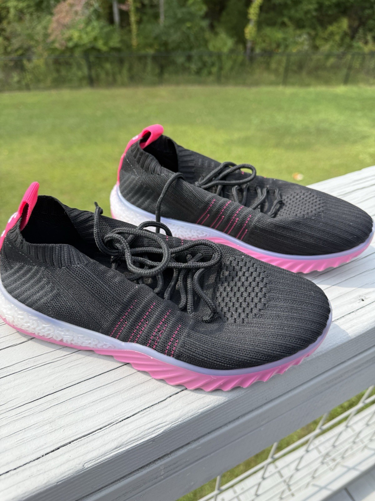 Danskin Positive lace-up sneaker with two toned upper and contrast trim.