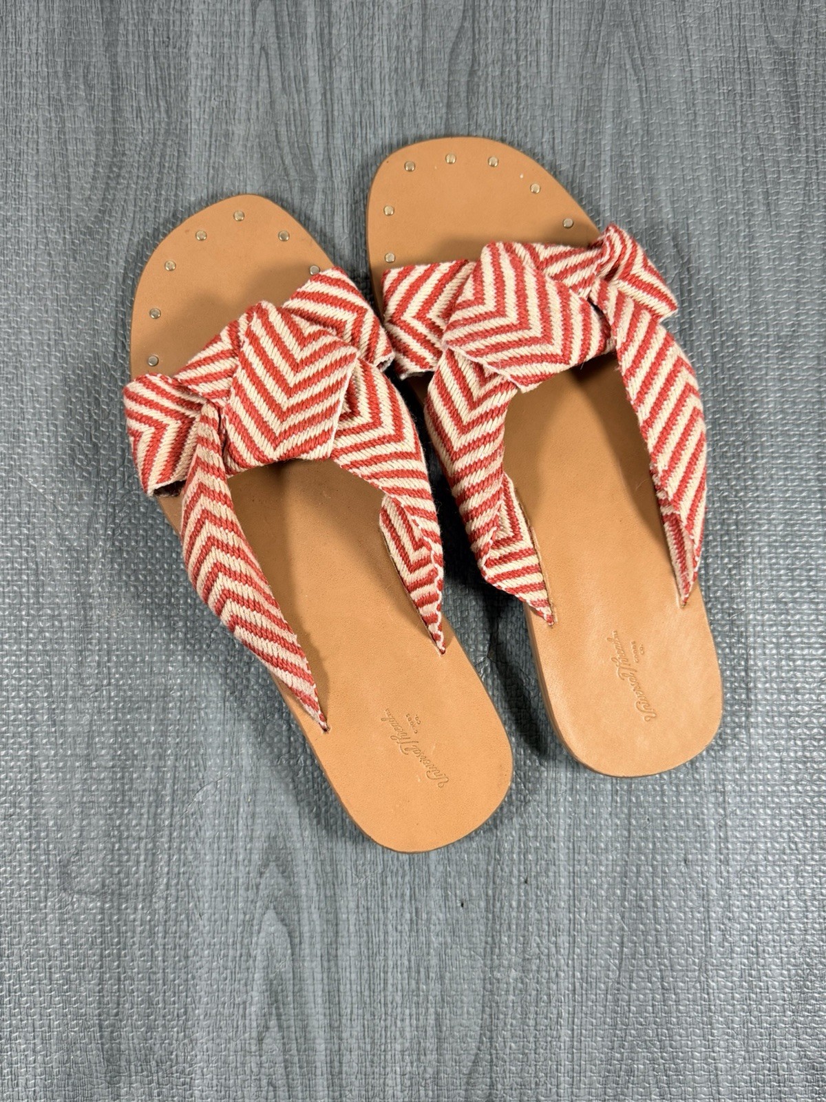 Red and White Chevron Patterned Slip-On Sandals with Studded Toe Detail