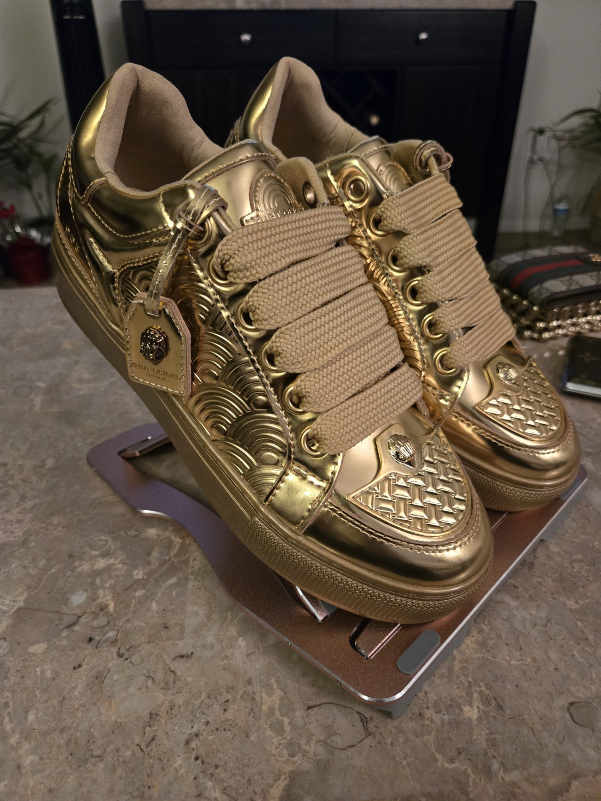 Kurt Geiger London Southbank Tag Platform Sneakers in metallic gold. Size 41