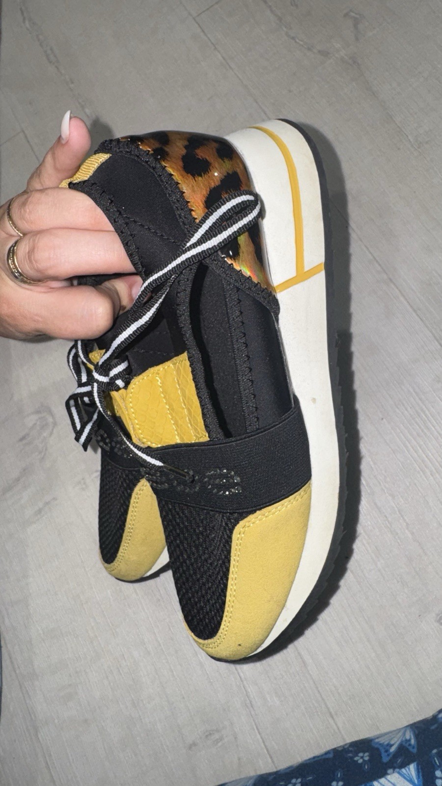 bebe Black/Yellow Low Top Lace-Up Athletic Sneakers with Animal Print