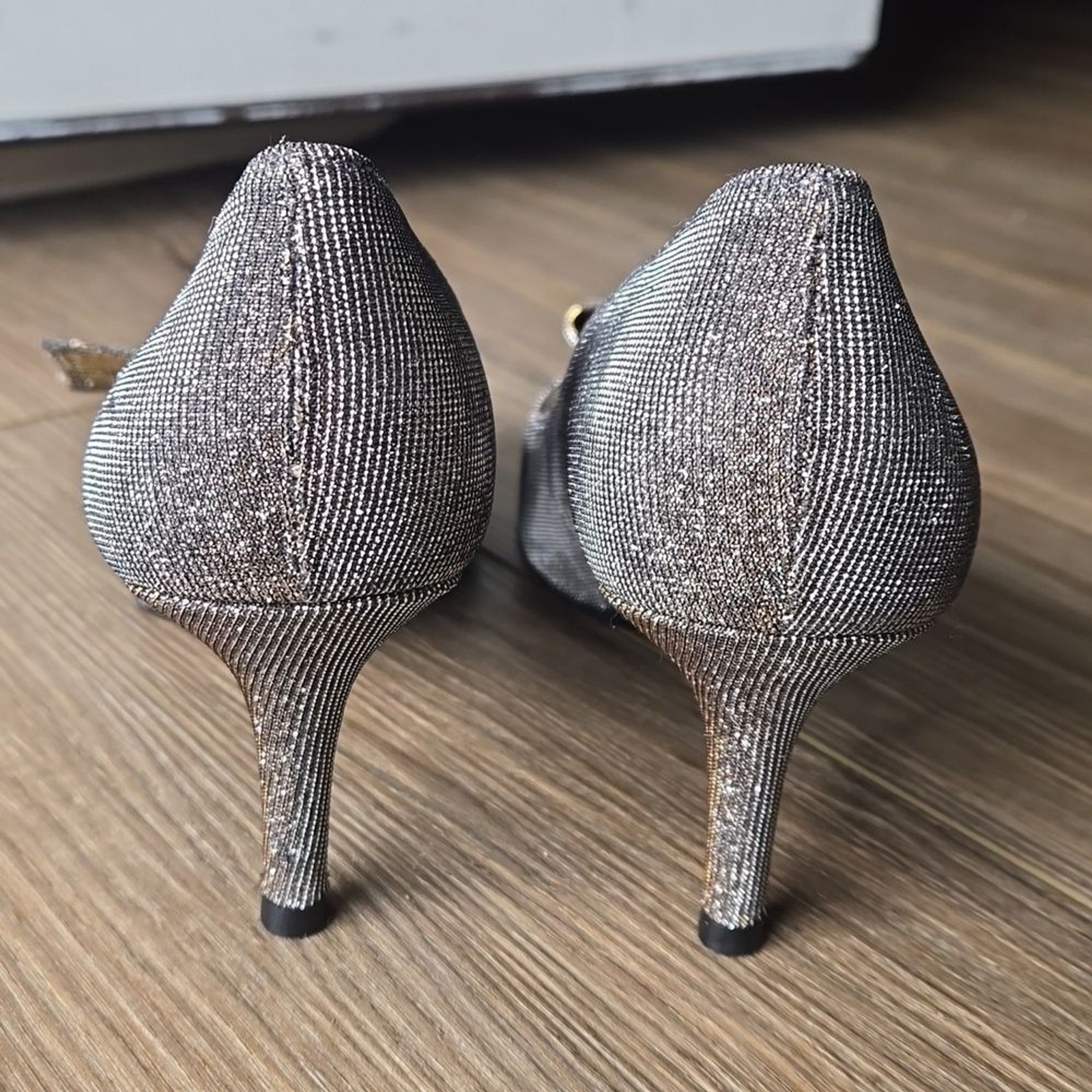 Stuart Weitzman Pyritr Bowover Two-Tone Silver and Gold Heels